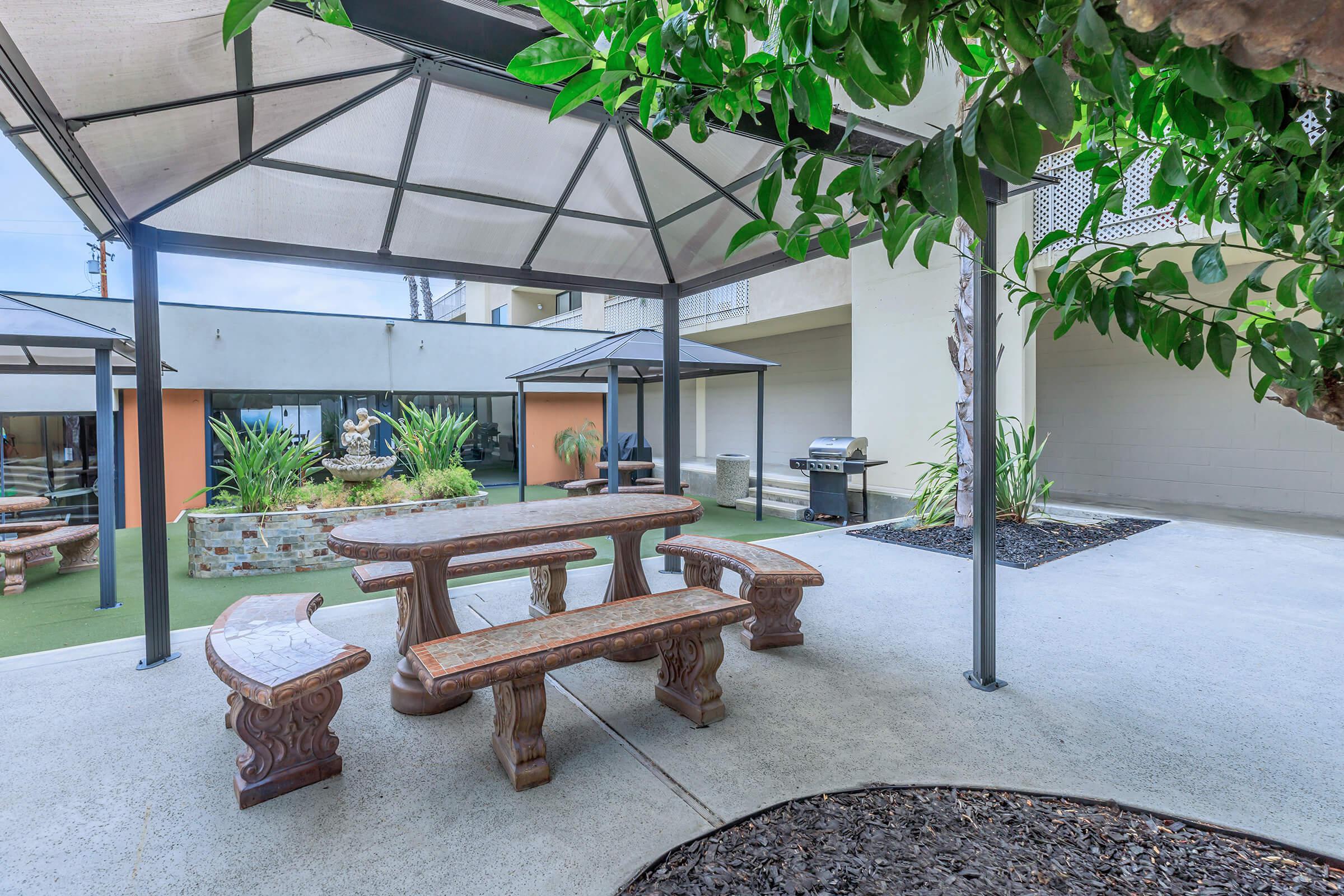 Picnic table in front of water feature