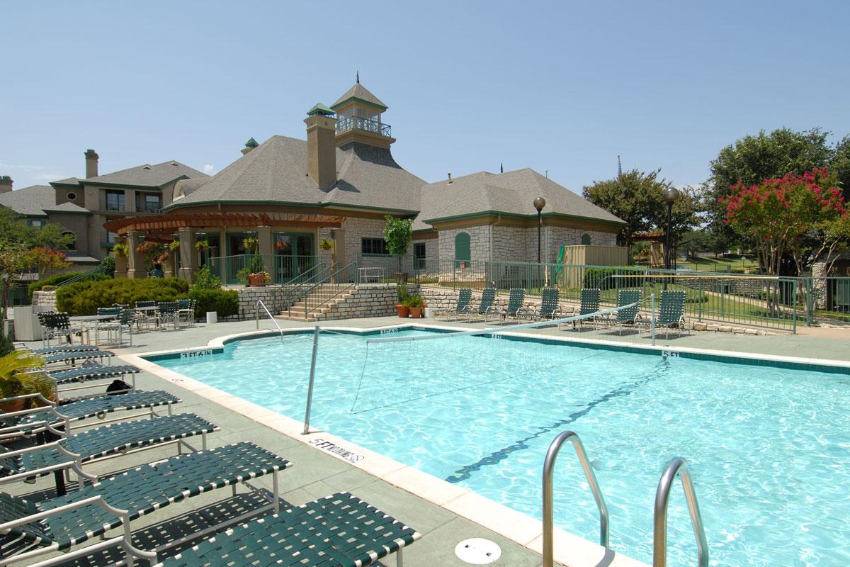 a large pool of water in front of a building