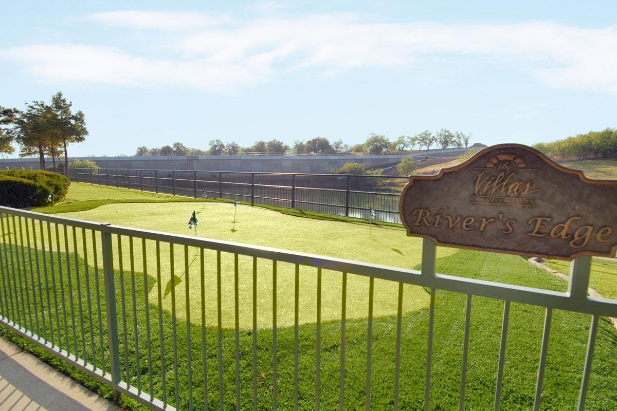 PUTTING GREEN ALONG THE RIVER'S EDGE