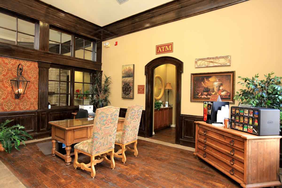 a living room filled with furniture and a fireplace