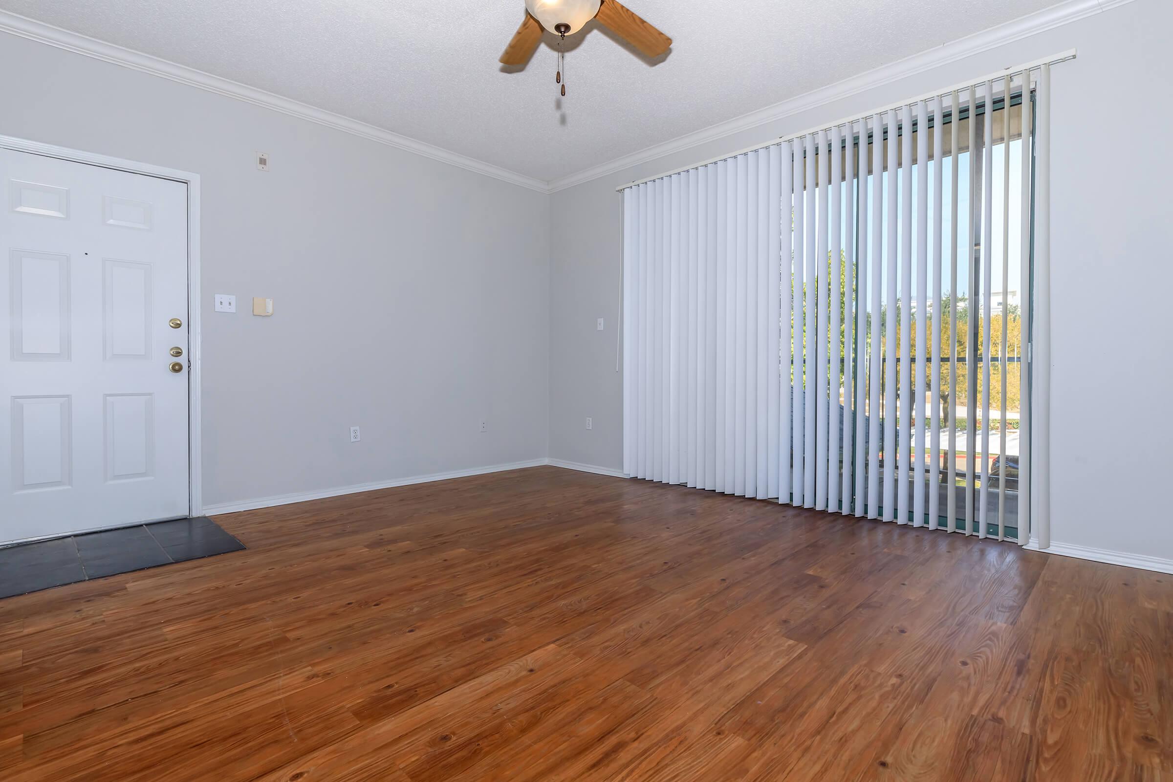 YOUR NEW LIVING ROOM WITH HARDWOOD-LIKE FLOORS