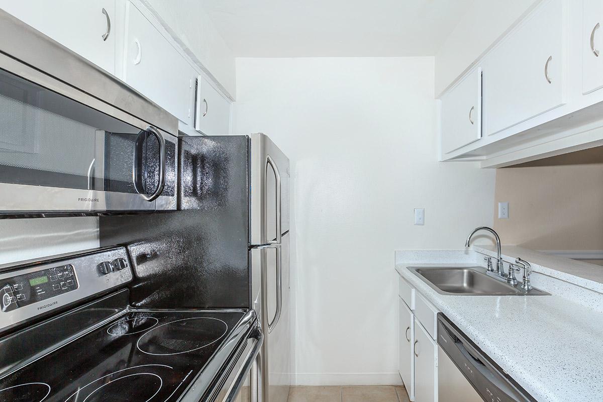 a kitchen with stainless steel appliances