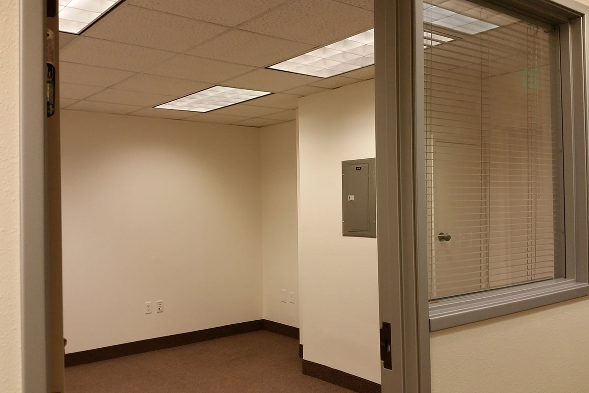 a white refrigerator freezer sitting in a room