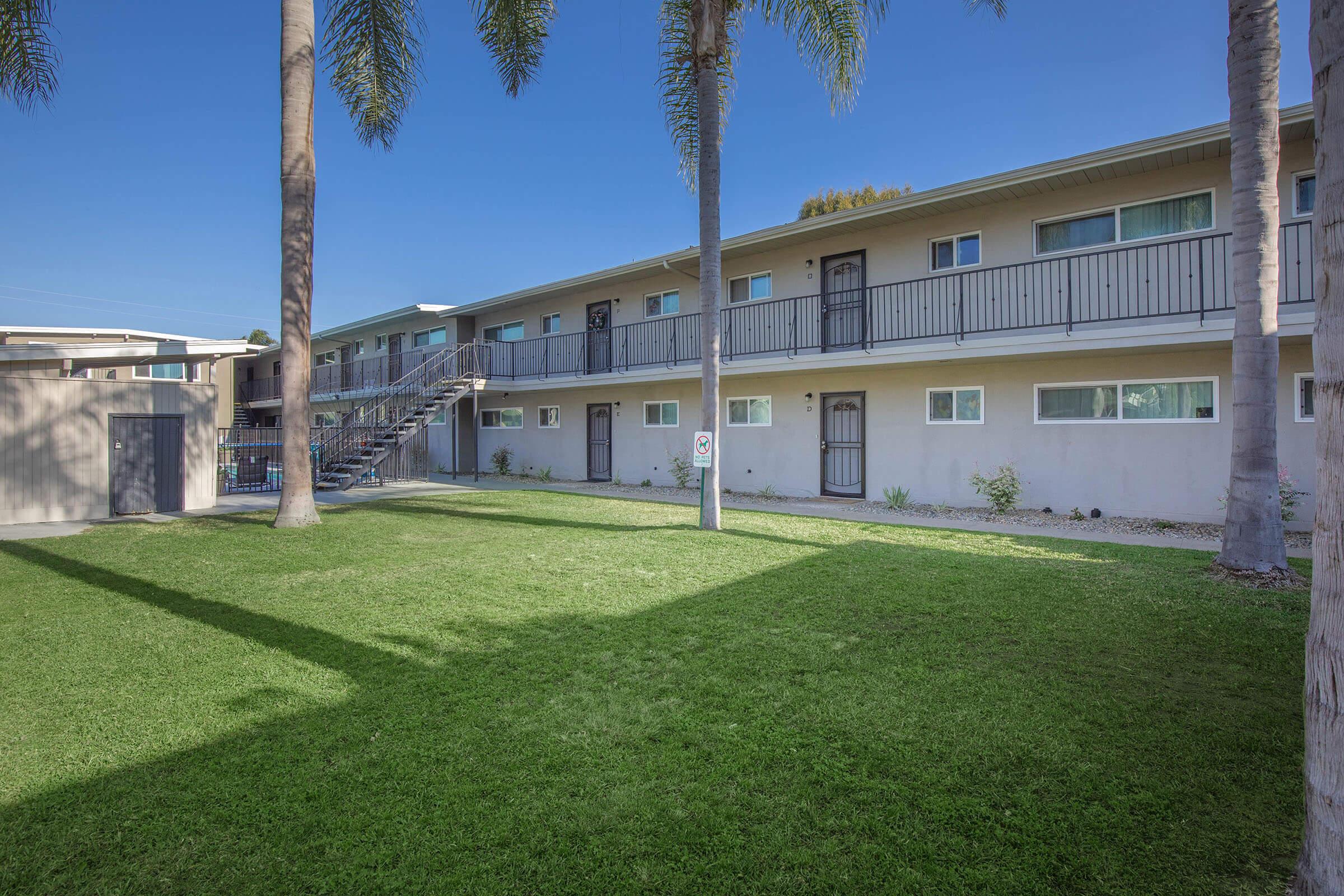 a large lawn in front of a house