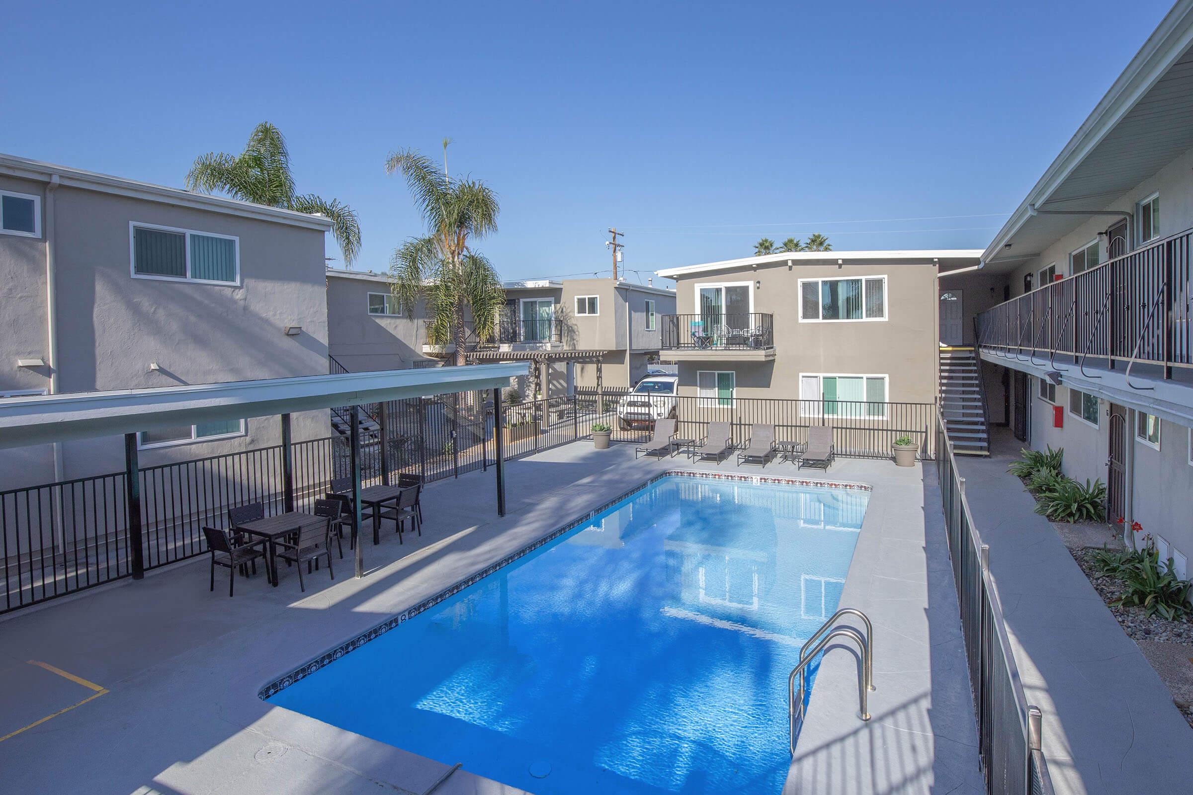 a pool next to a building