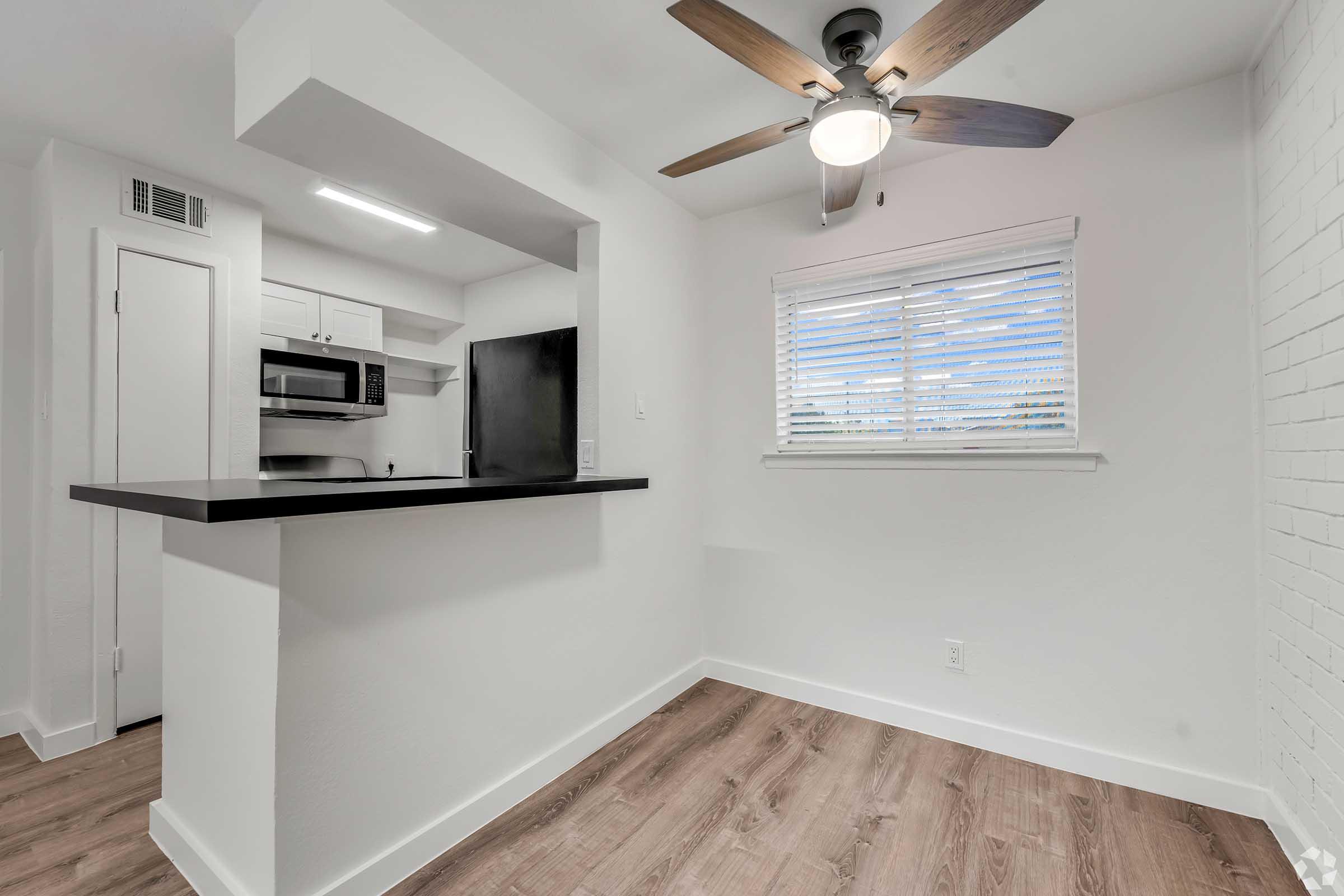 a kitchen with a sink and a window