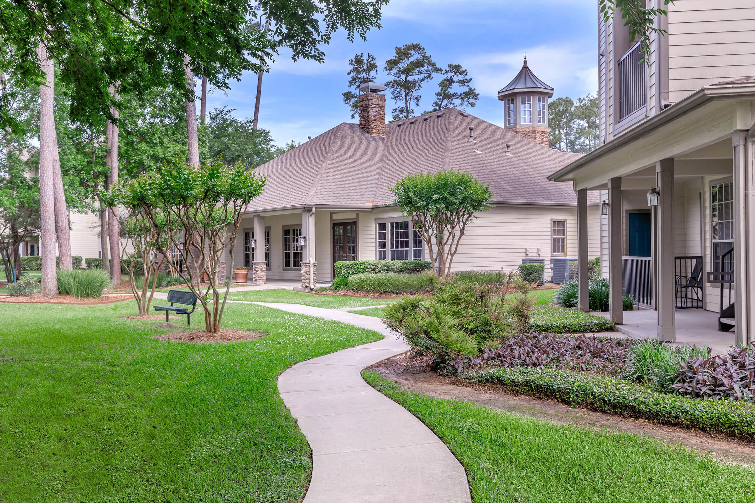 a large lawn in front of a house