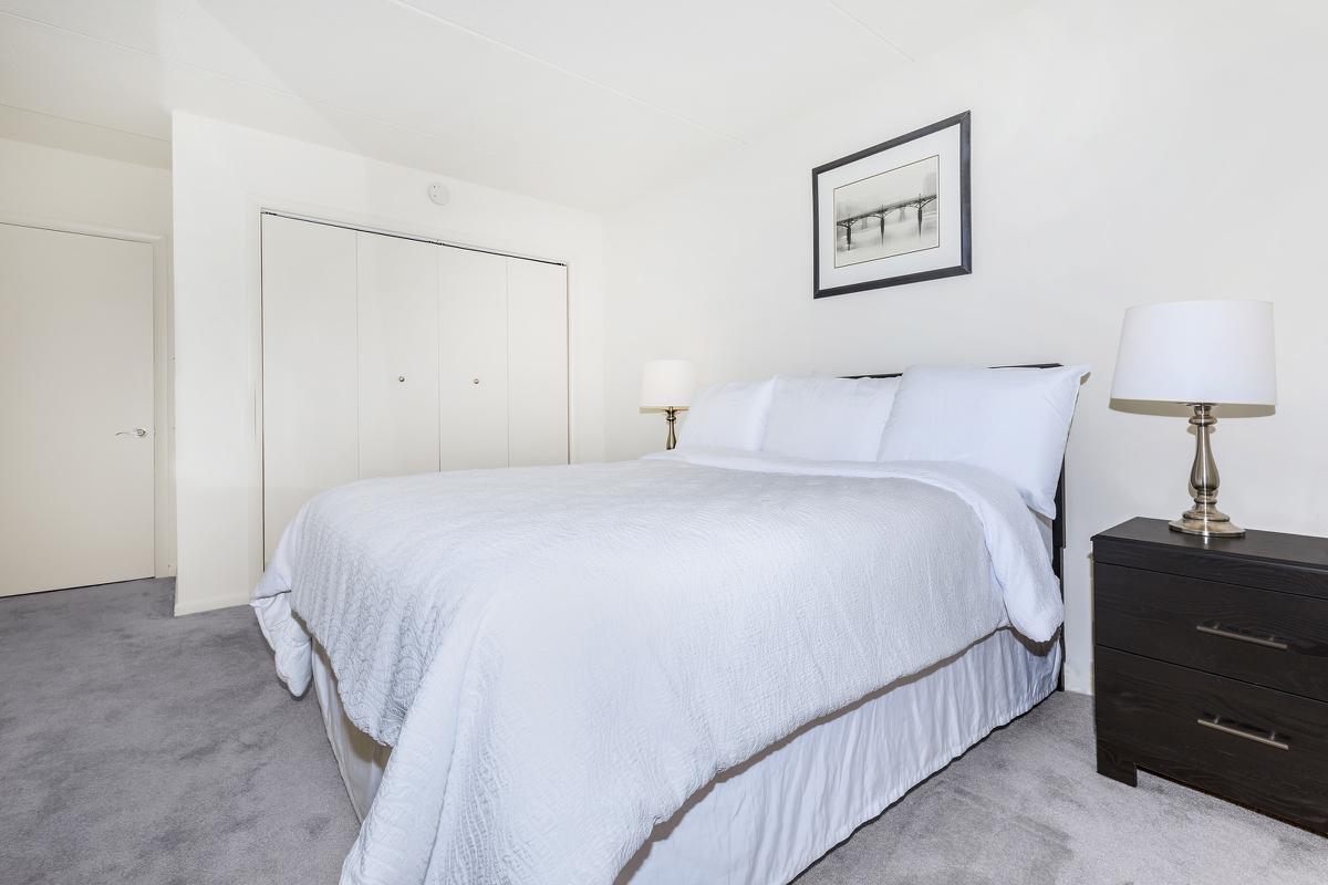 a bedroom with a bed in a hotel room