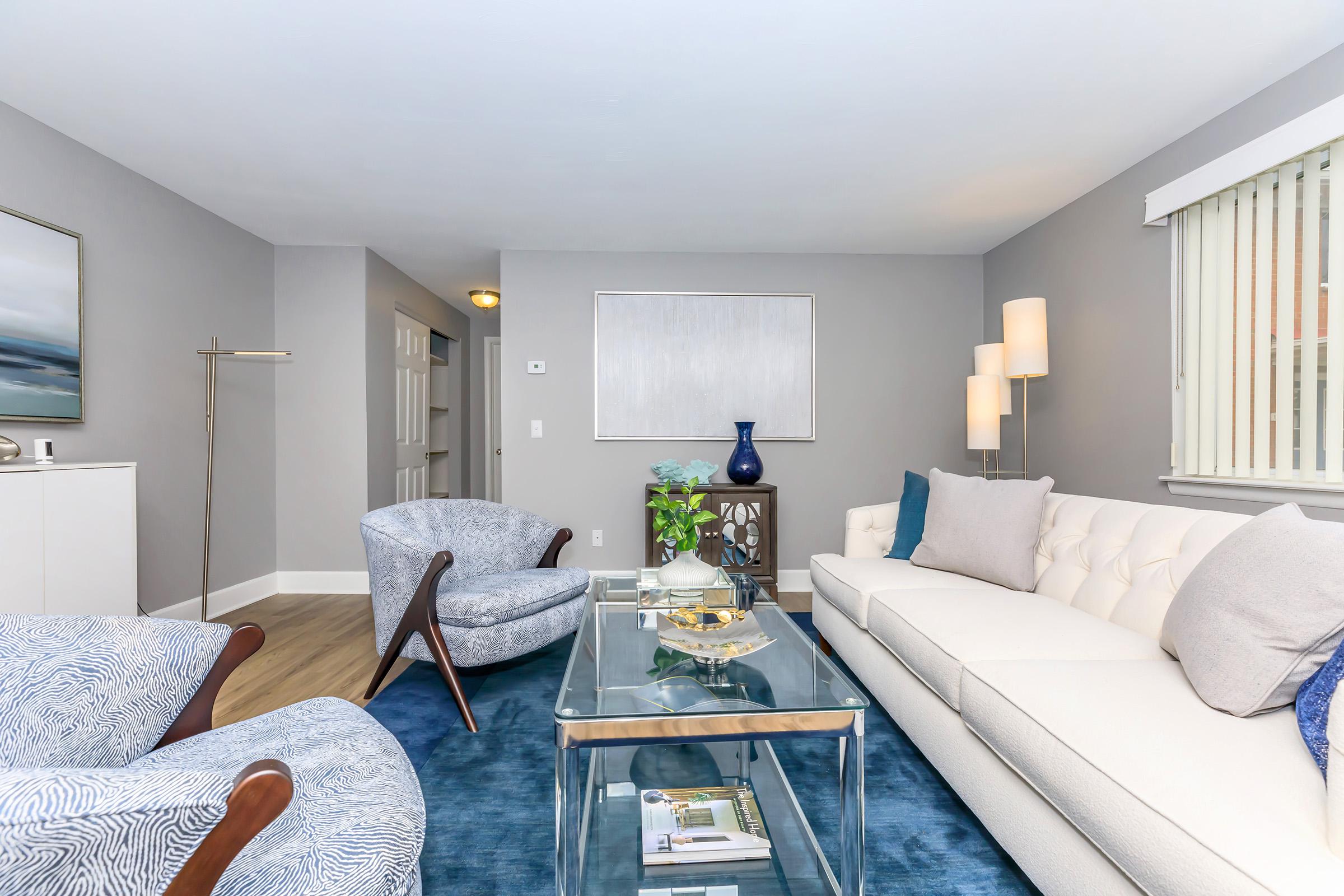 a large bed sitting in a living room