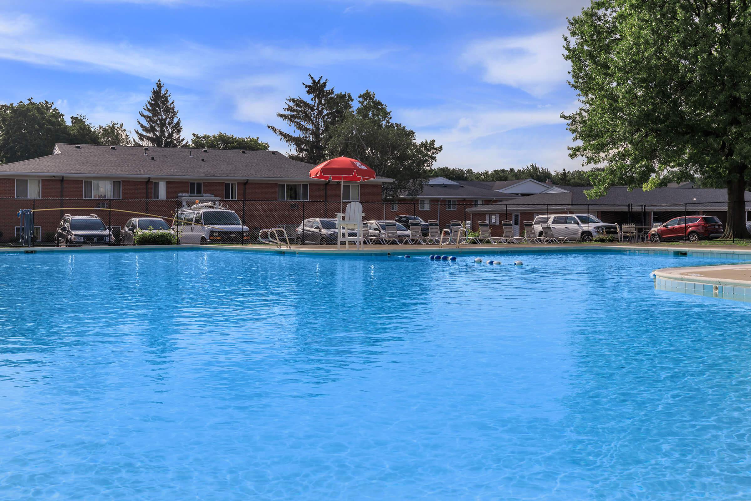 a pool next to a body of water