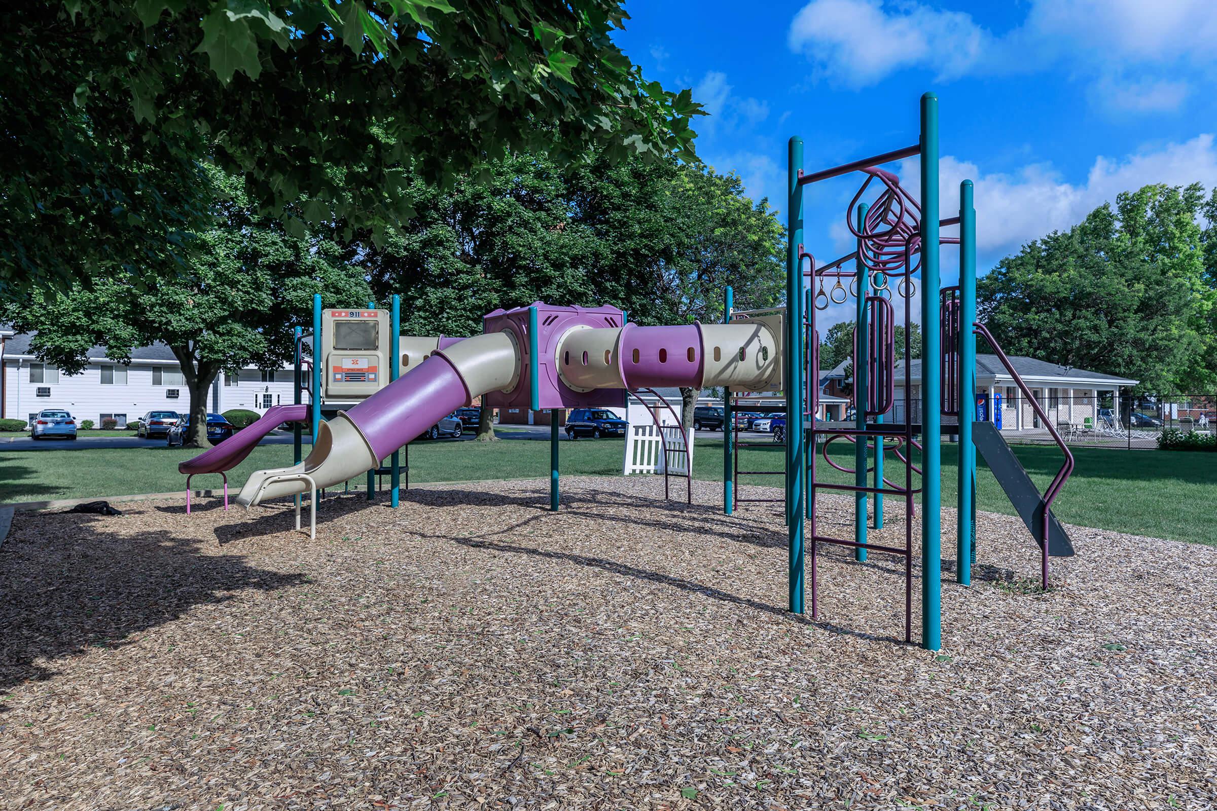 a playground with a blue chair