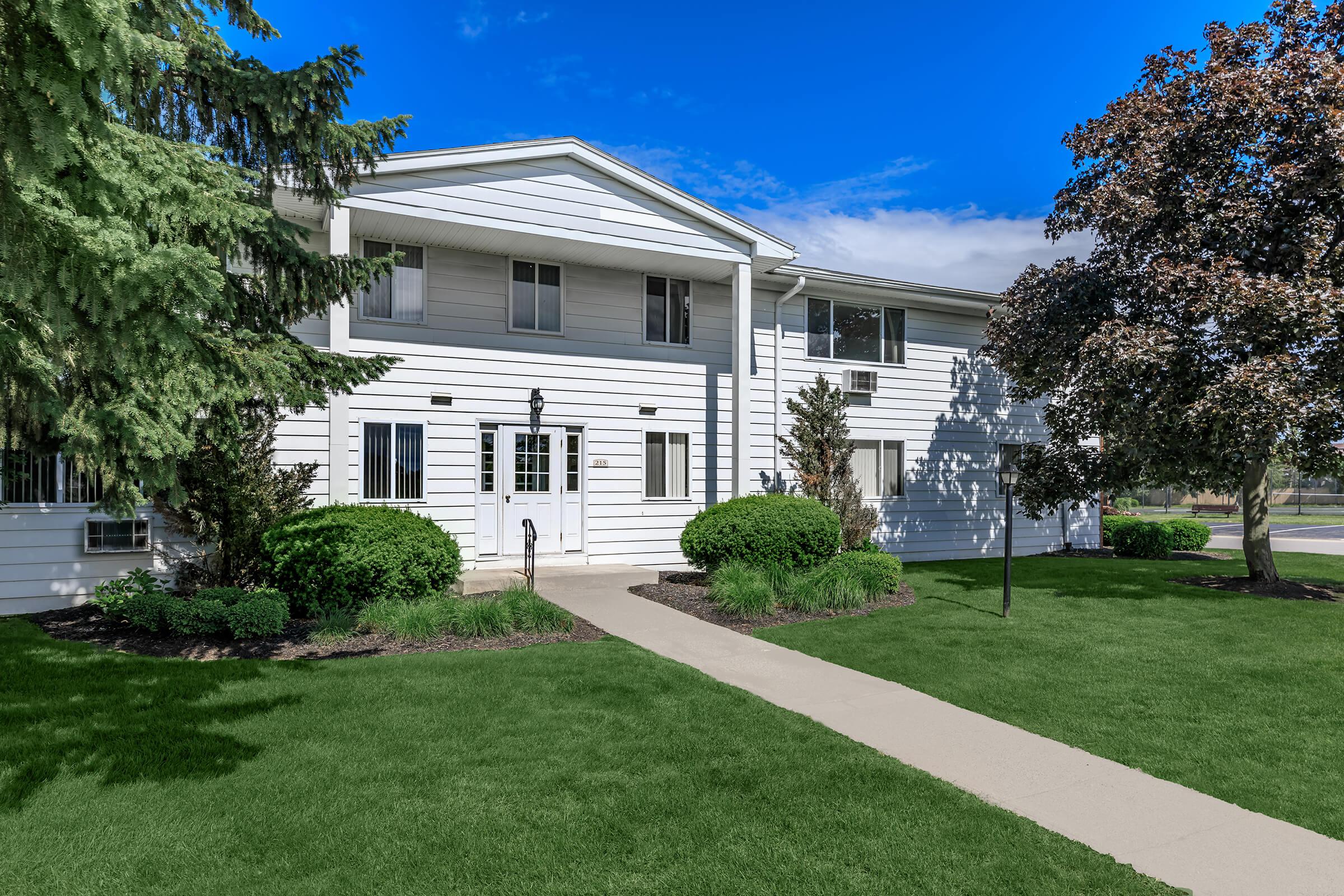 a large lawn in front of a house