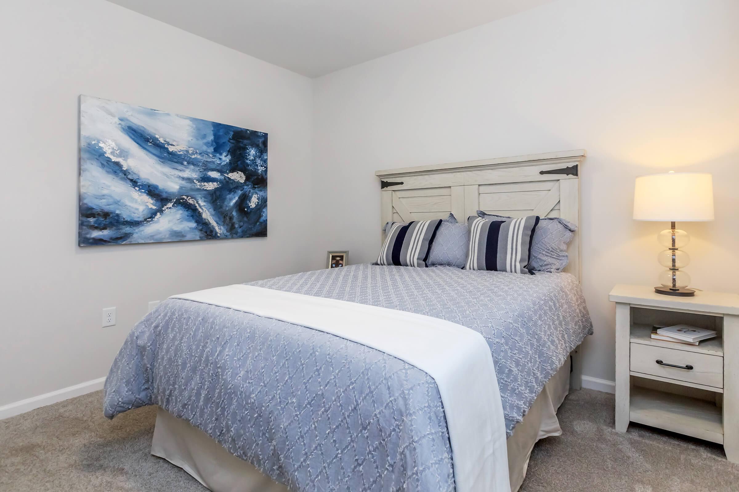 Cozy Bedroom in Riverstone Apartments At Long Shoals in Arden, NC