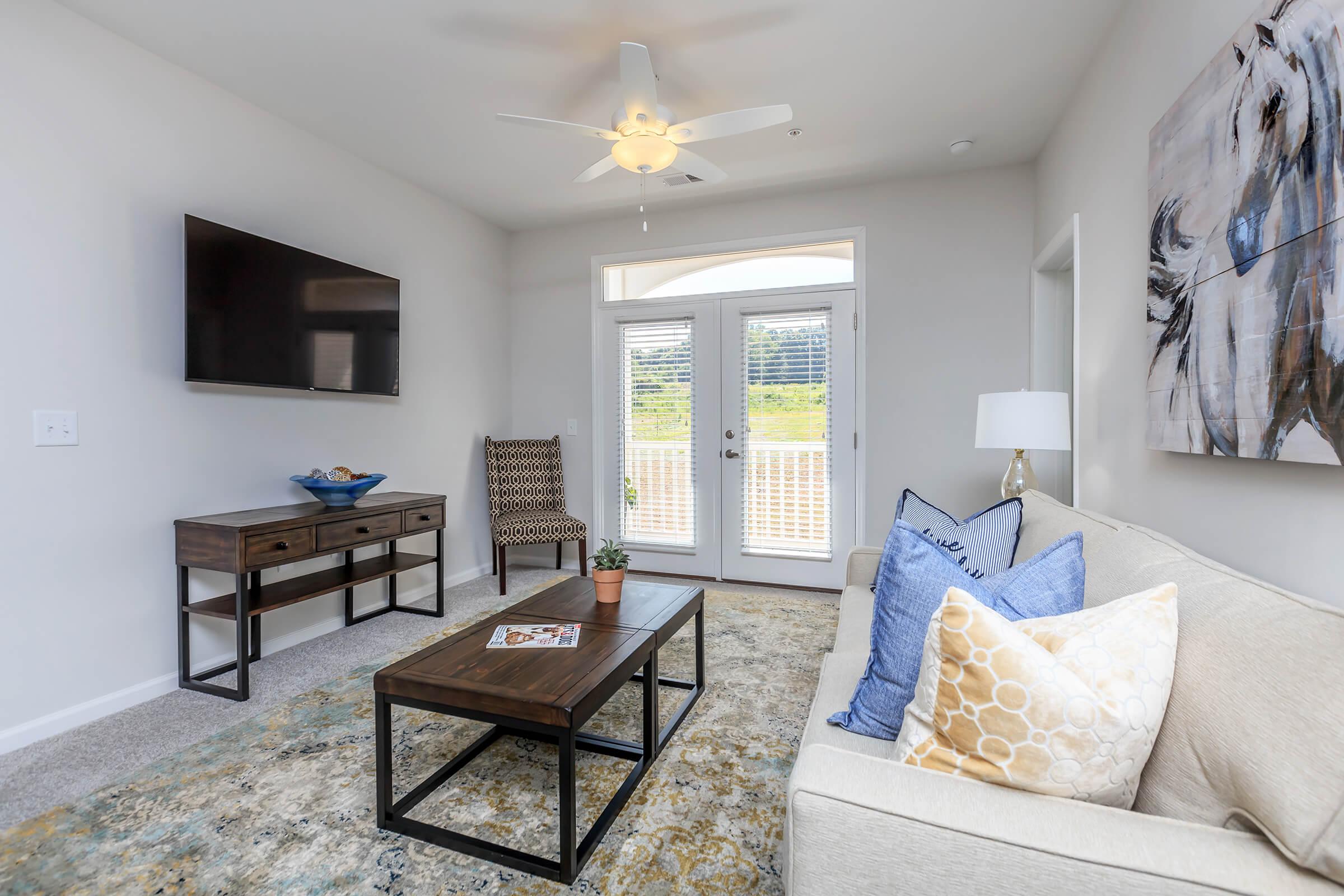 Enjoy The Sun From Your Balcony Or Patio At Riverstone Apartments At Long Shoals in Arden, NC