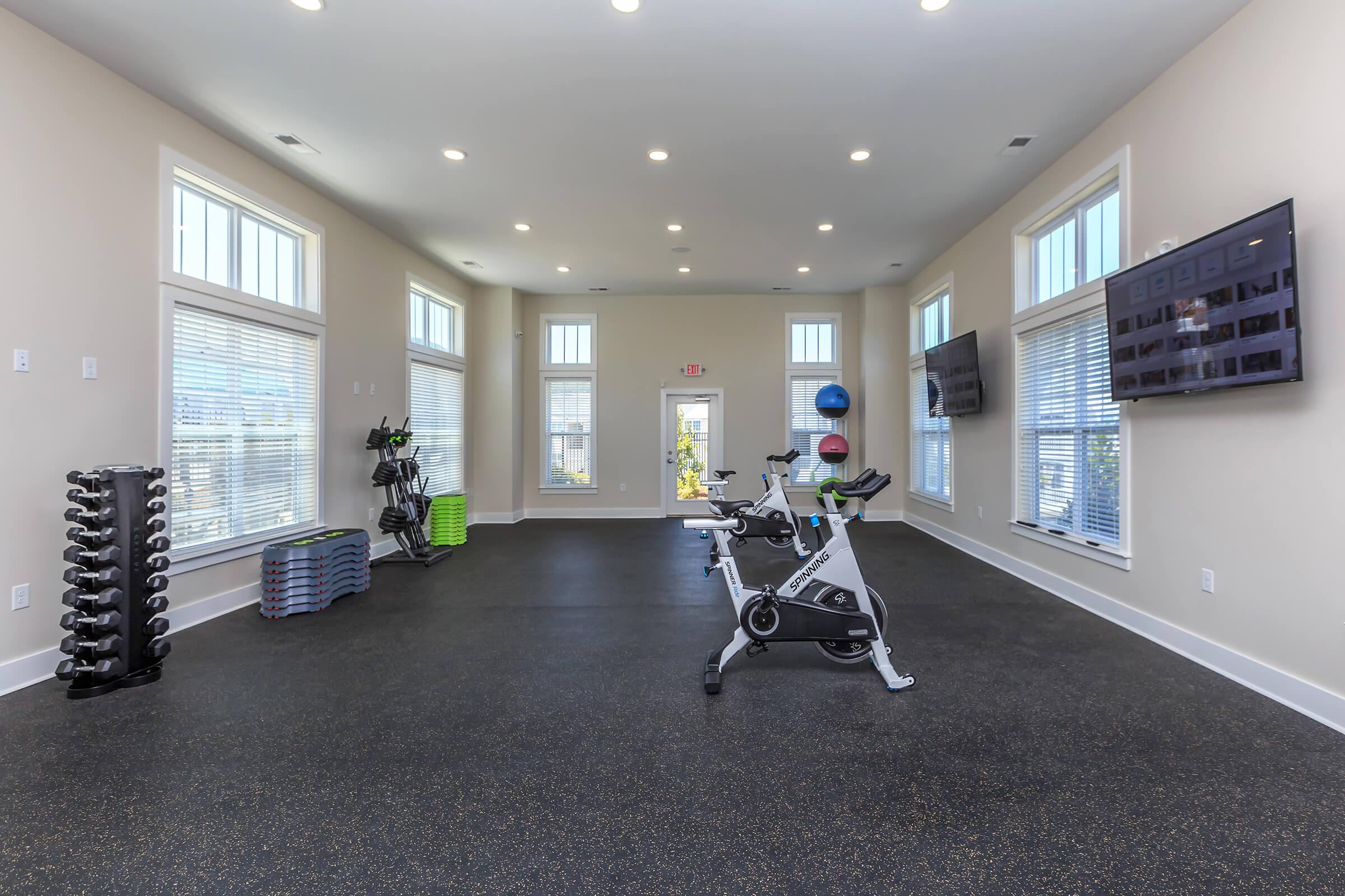 Magnificent State-of-the-art Fitness Center In Riverstone Apartments At Long Shoals in Arden, NC