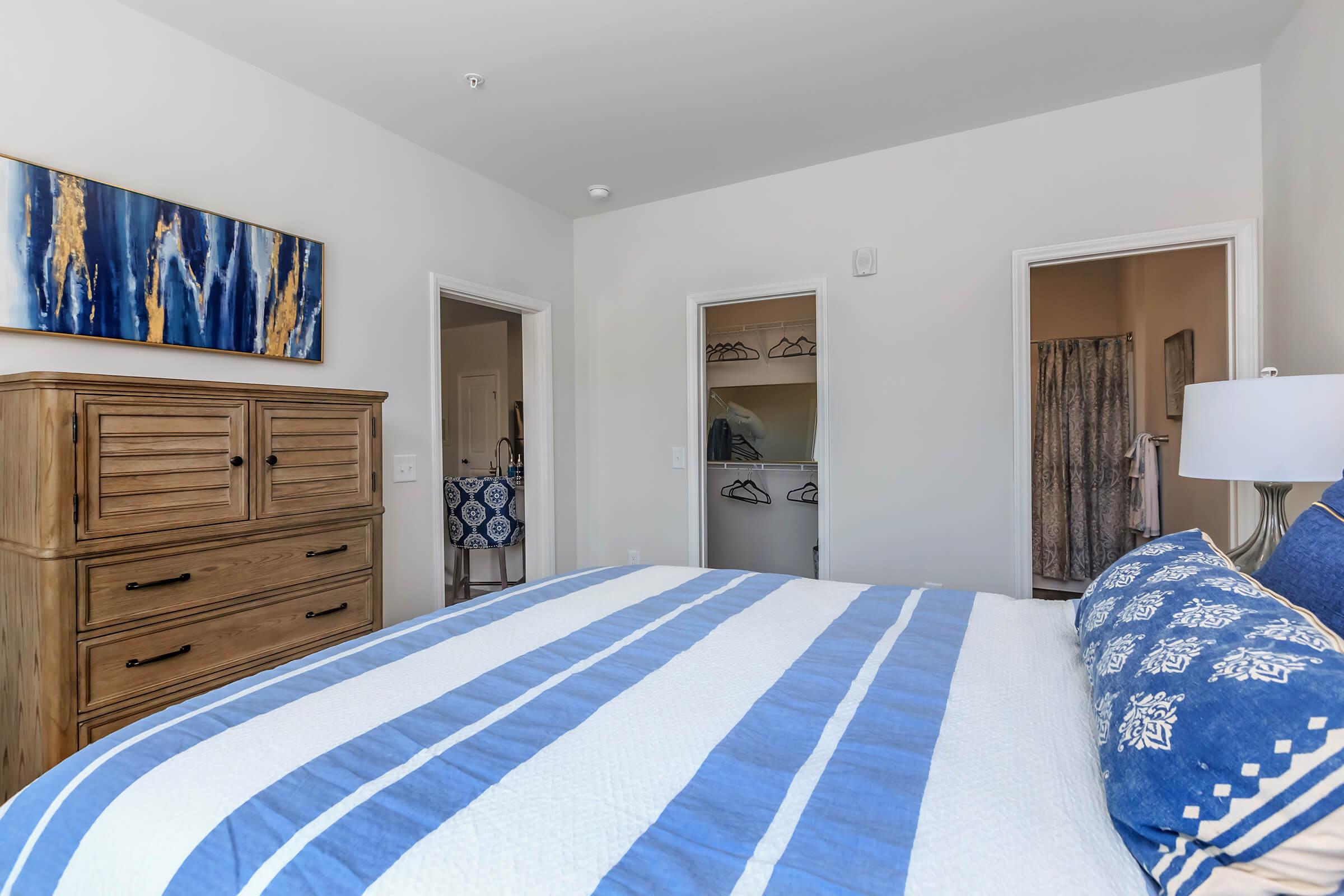 Cozy Bedroom In Riverstone Apartments At Long Shoals In Arden, NC