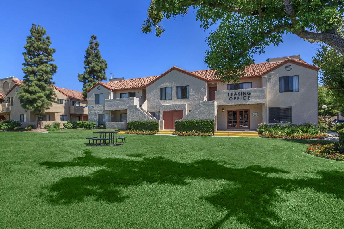 a large lawn in front of a house