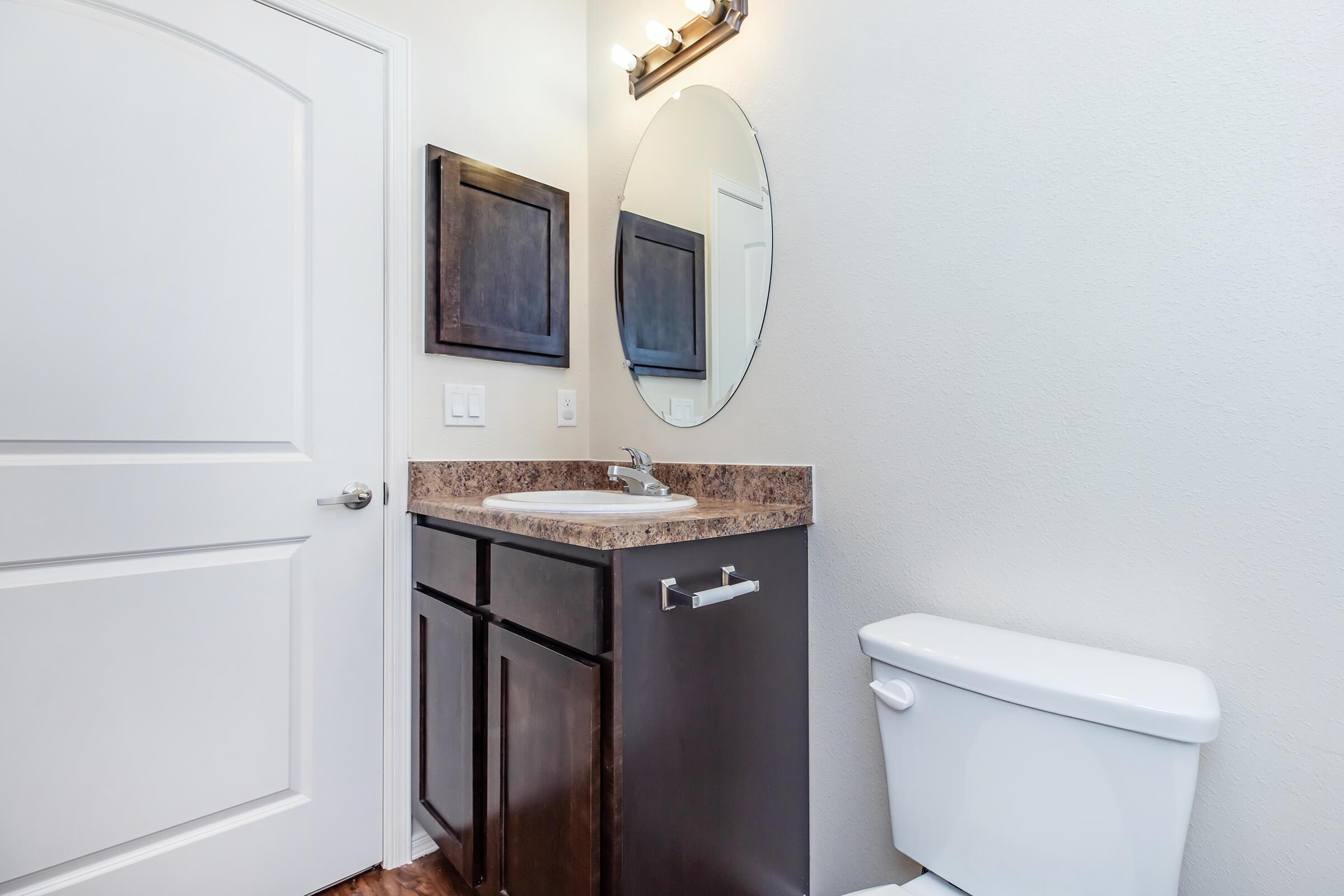 a close up of a sink in a small room