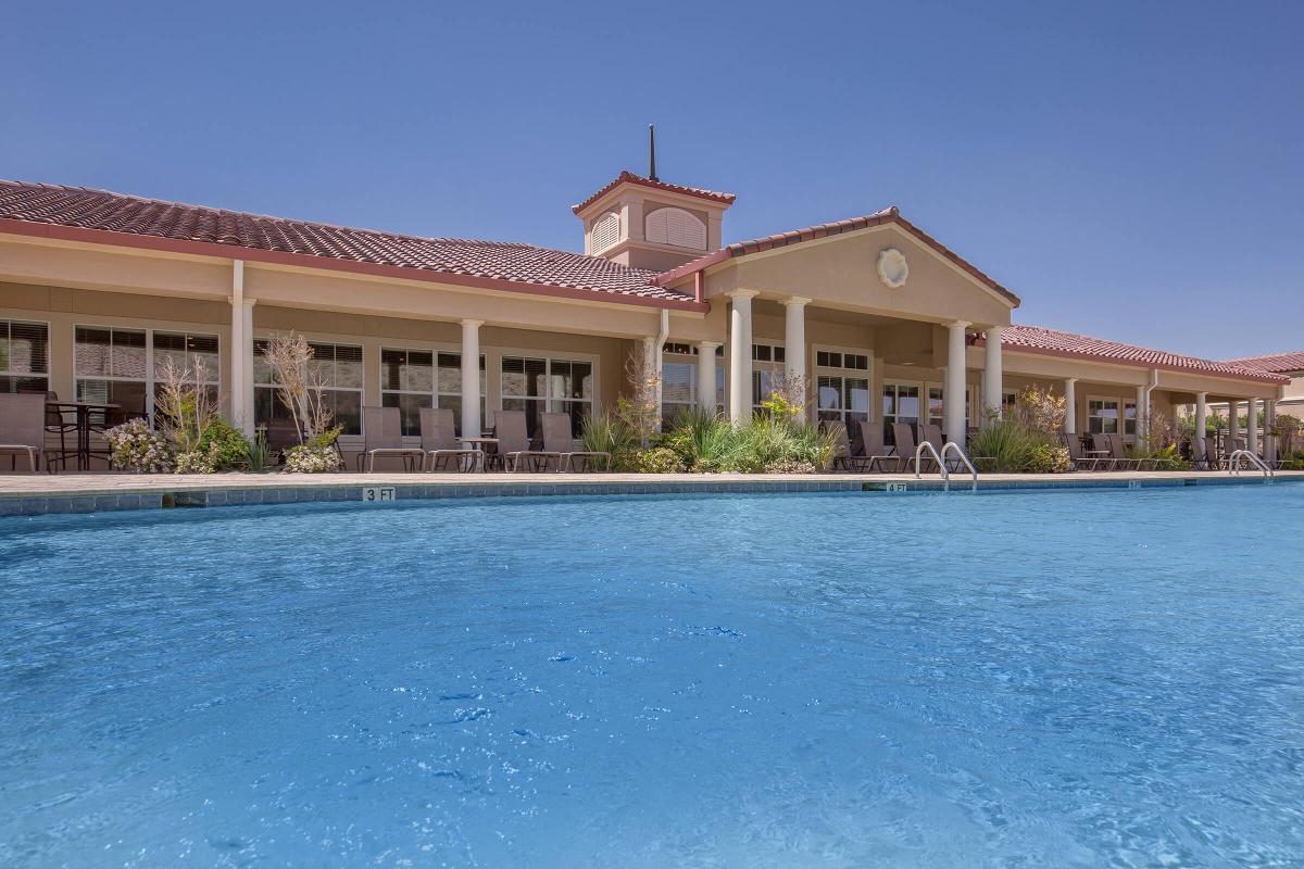 a house with a large pool of water