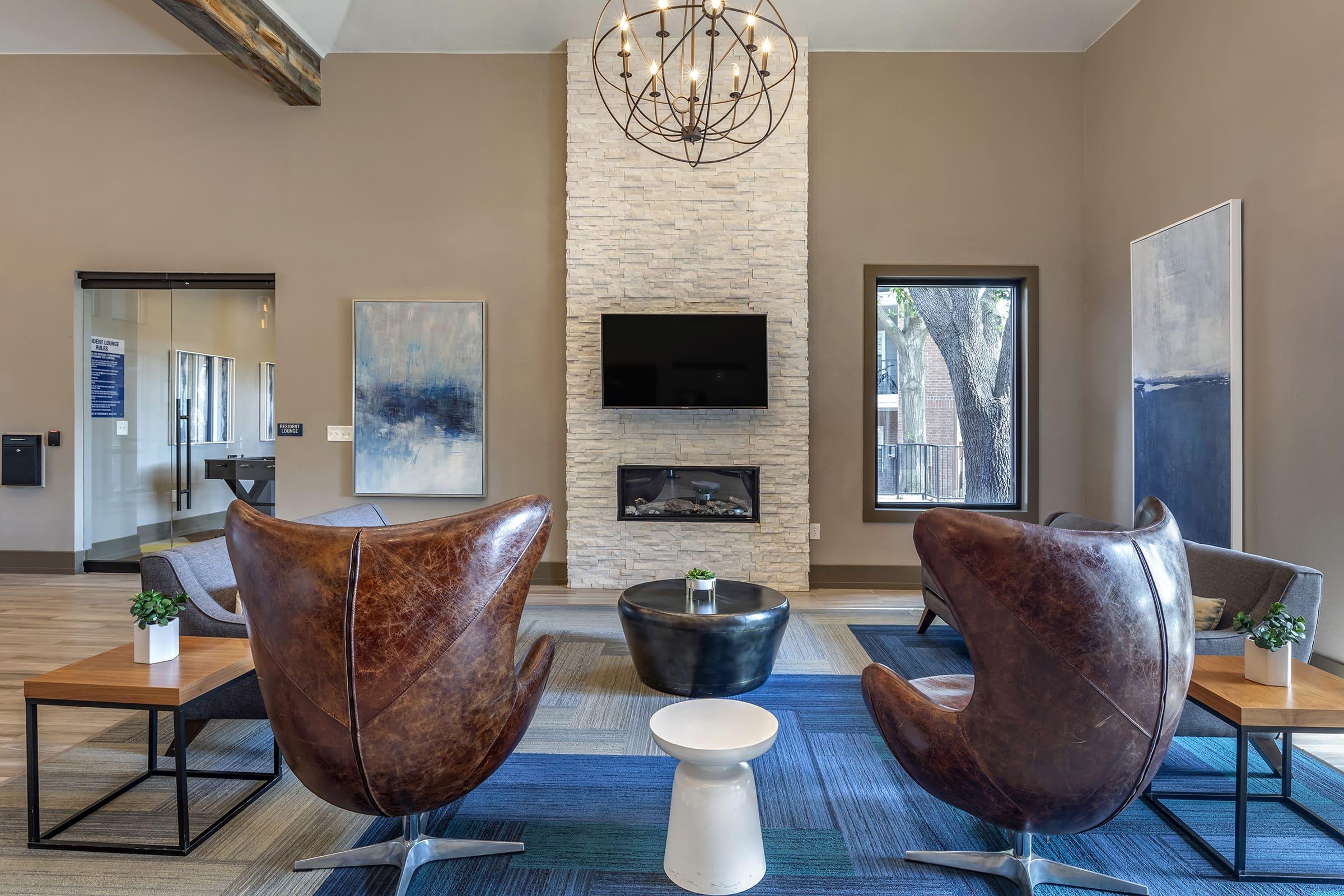 a living room filled with furniture and a fireplace