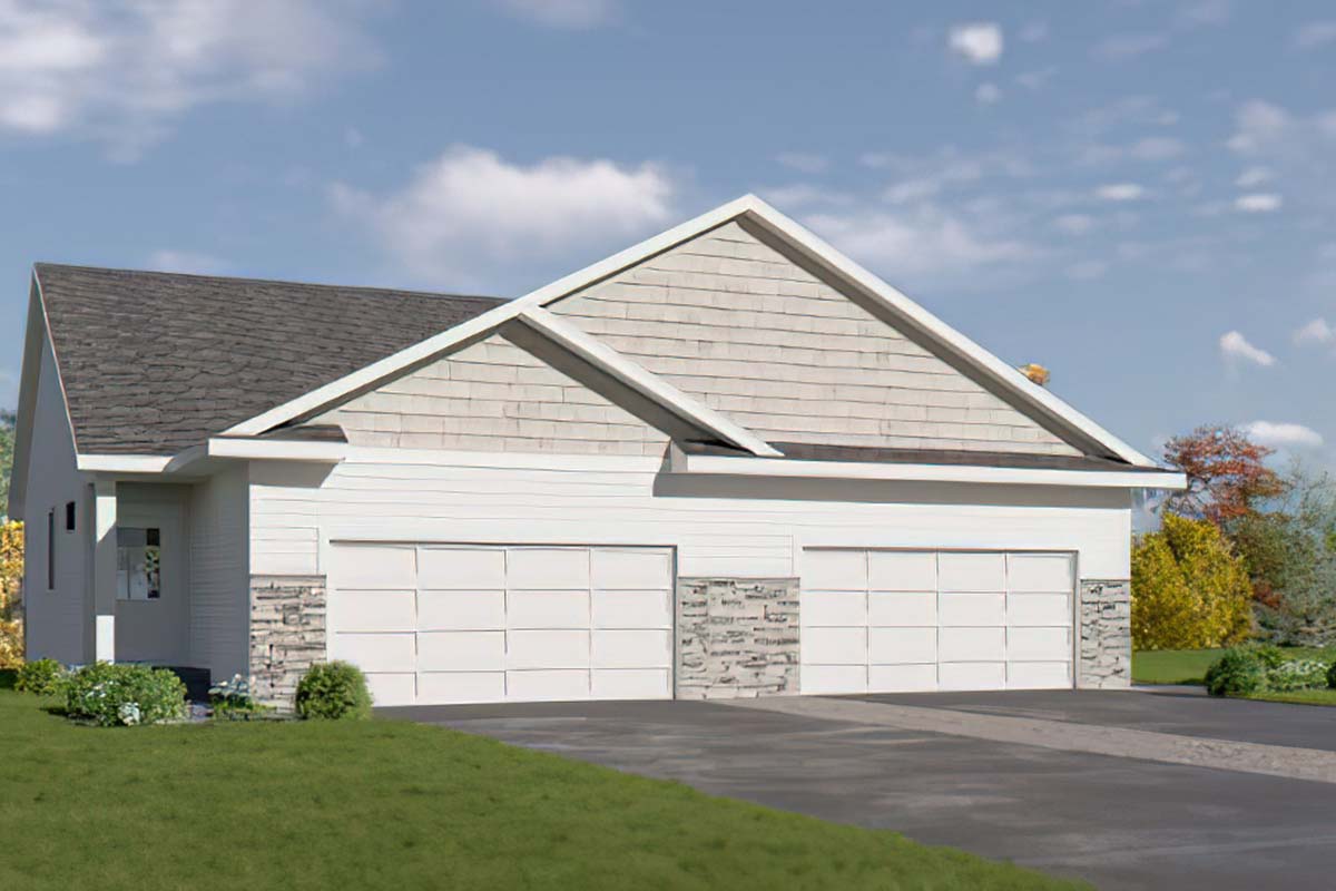 A modern two-car garage featuring a sloped roof, stone accents on the lower half, and a light-colored exterior. The driveway is paved, leading to the garage doors. Surrounding the garage are well-maintained green lawns and a few trees in the background with a blue sky and fluffy clouds.