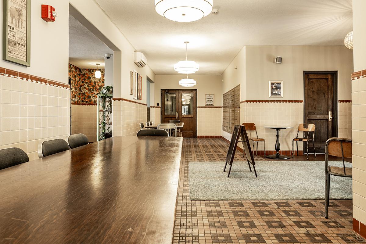 a living room filled with furniture and a rug