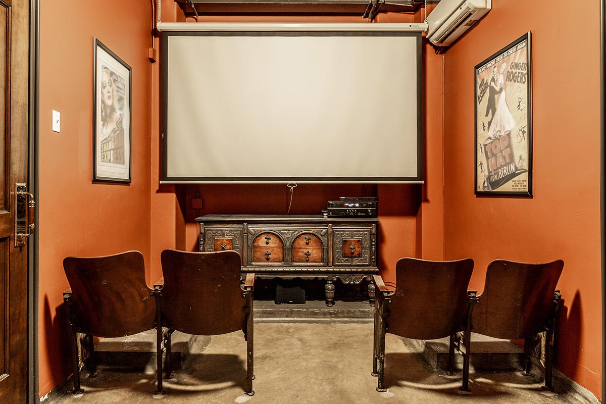 a living room filled with furniture and a fireplace