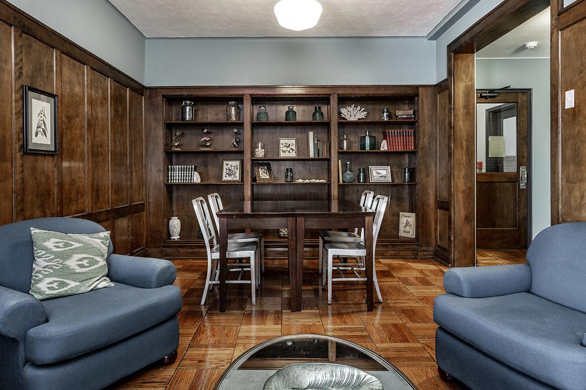 a living room filled with furniture and a fireplace