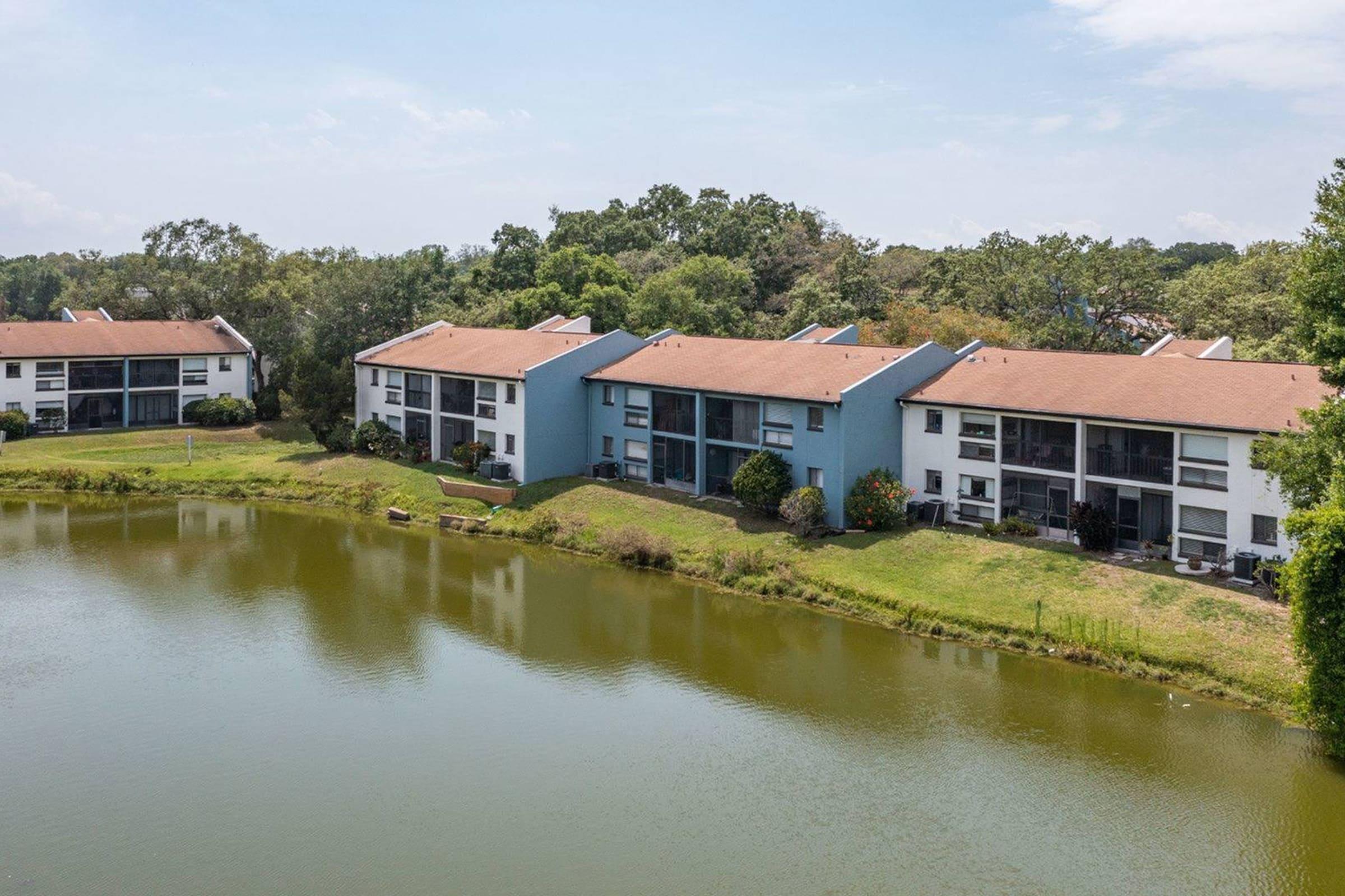 a small house surrounded by water