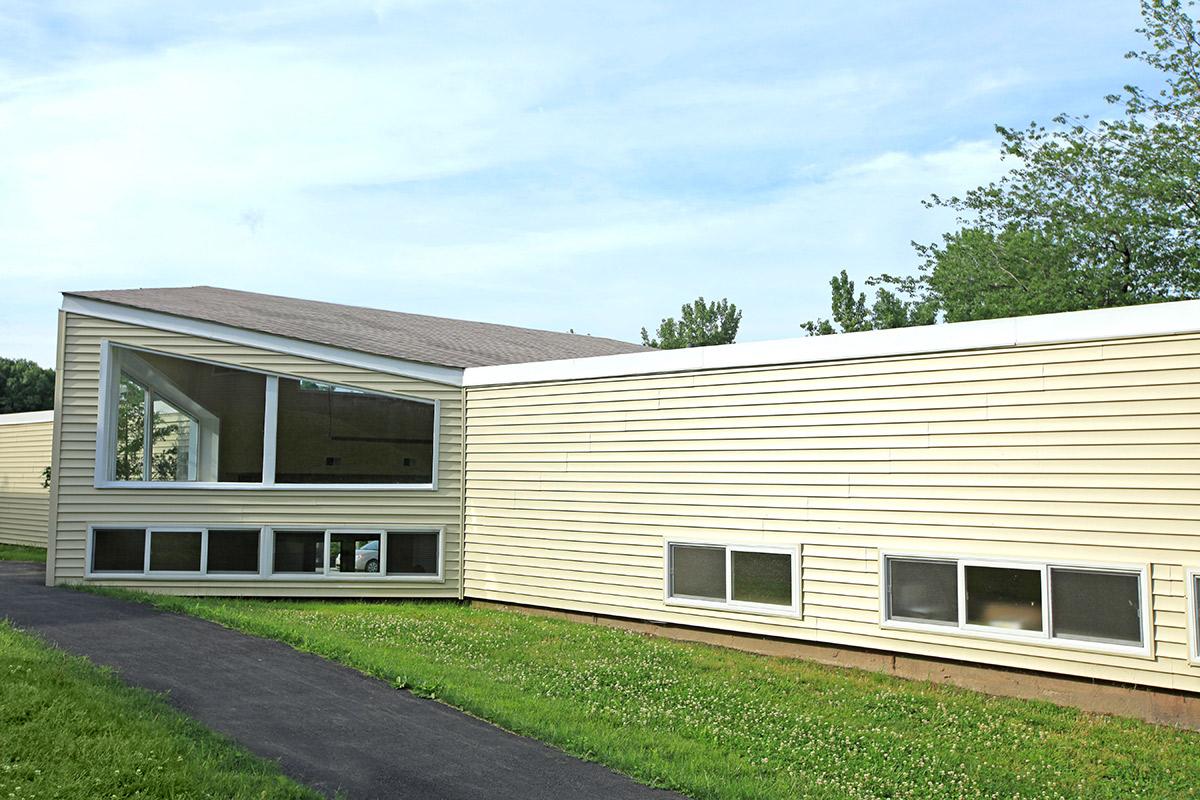 a large lawn in front of a house