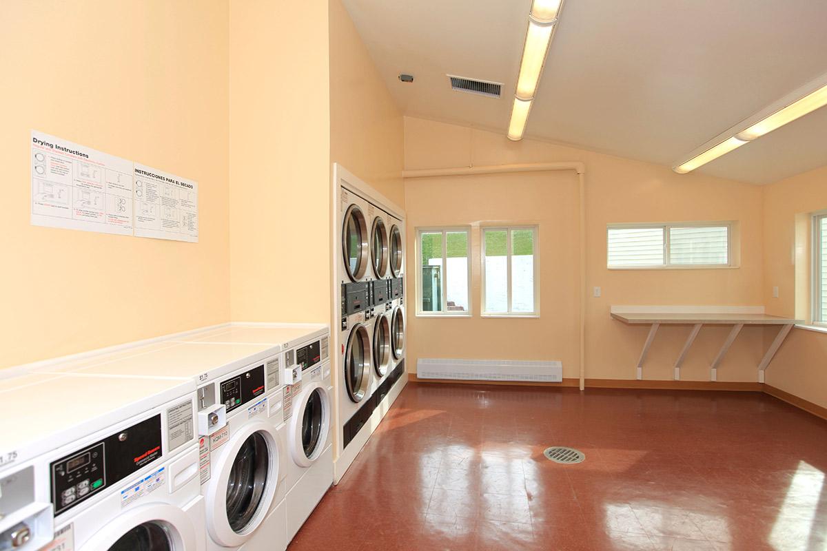 a kitchen with a stove and a microwave