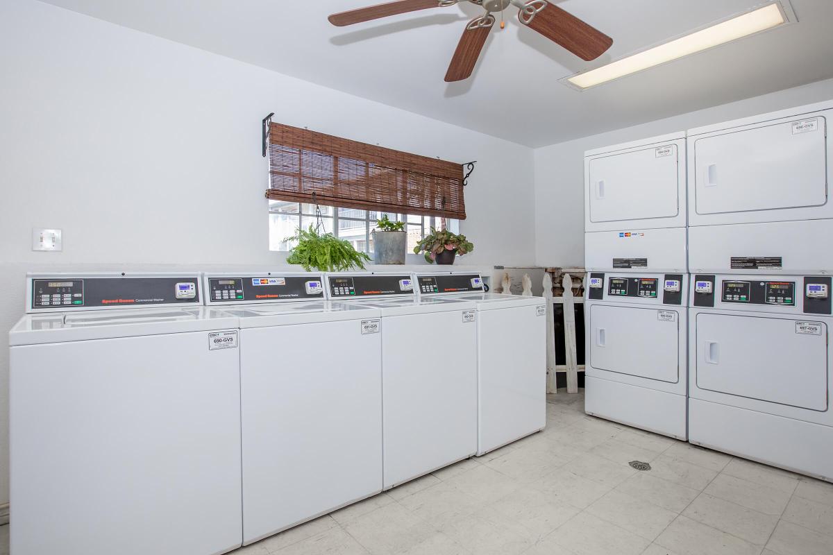 a large white refrigerator in a kitchen