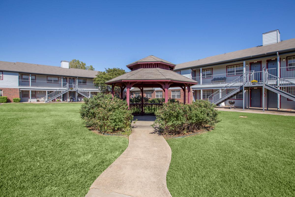 a large lawn in front of a building