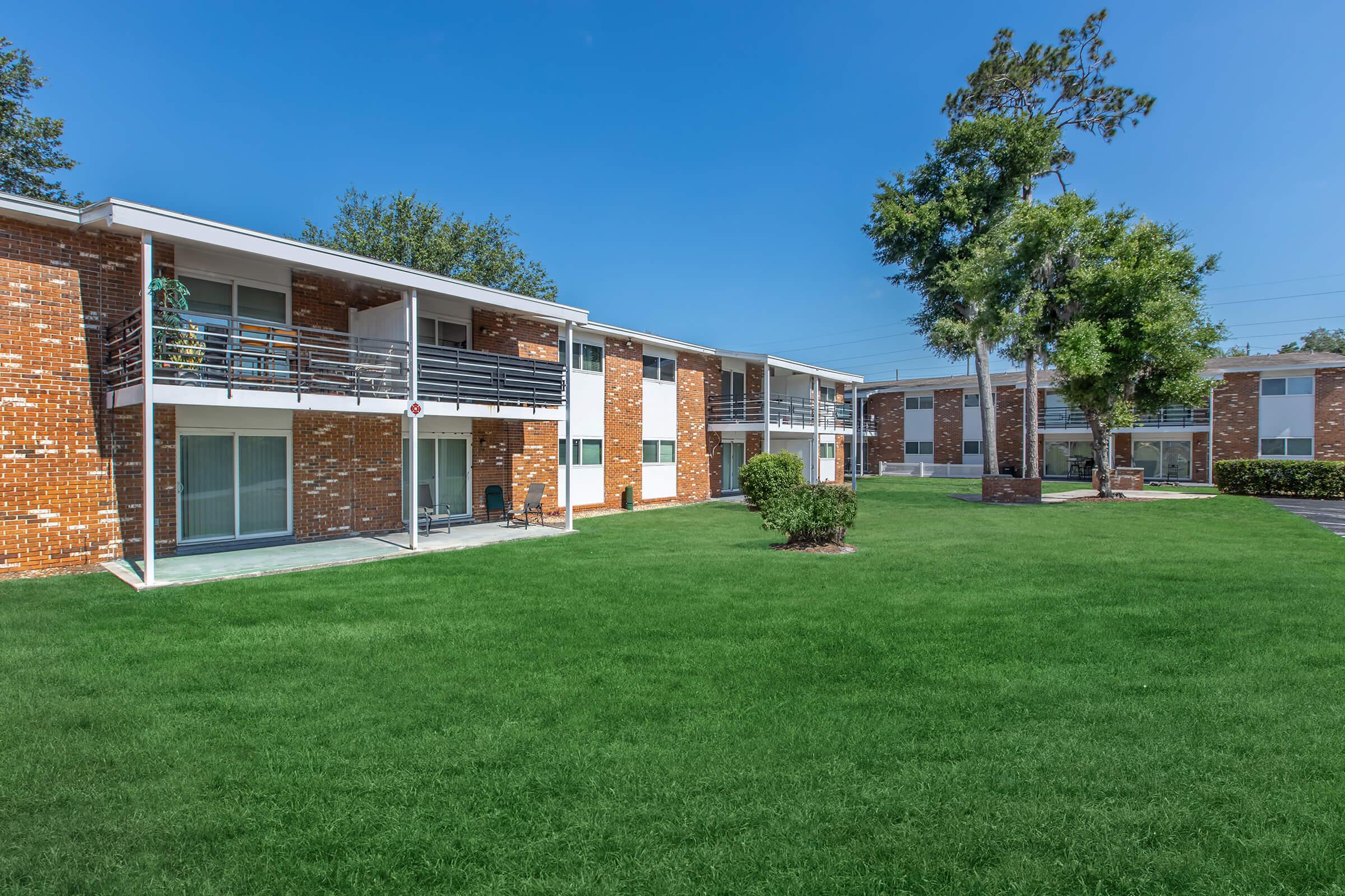 a large lawn in front of a house