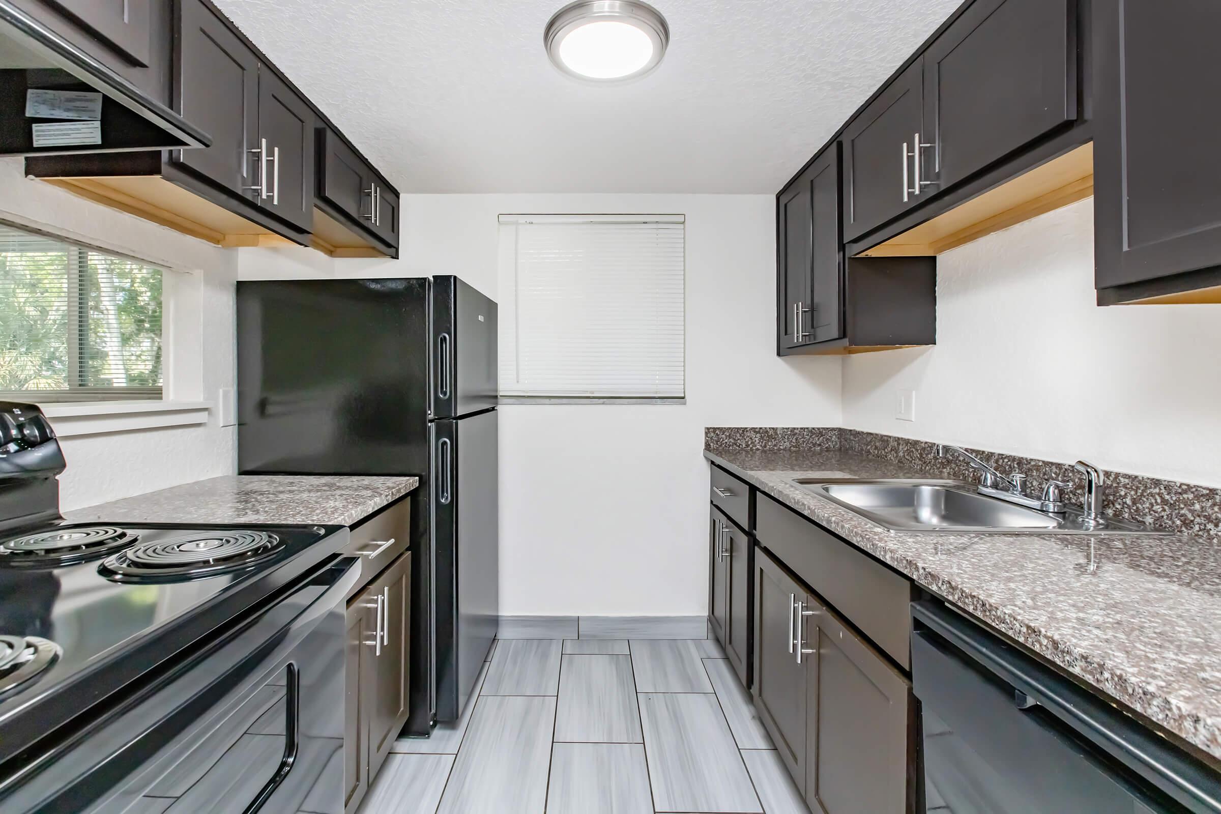 a modern kitchen with stainless steel appliances