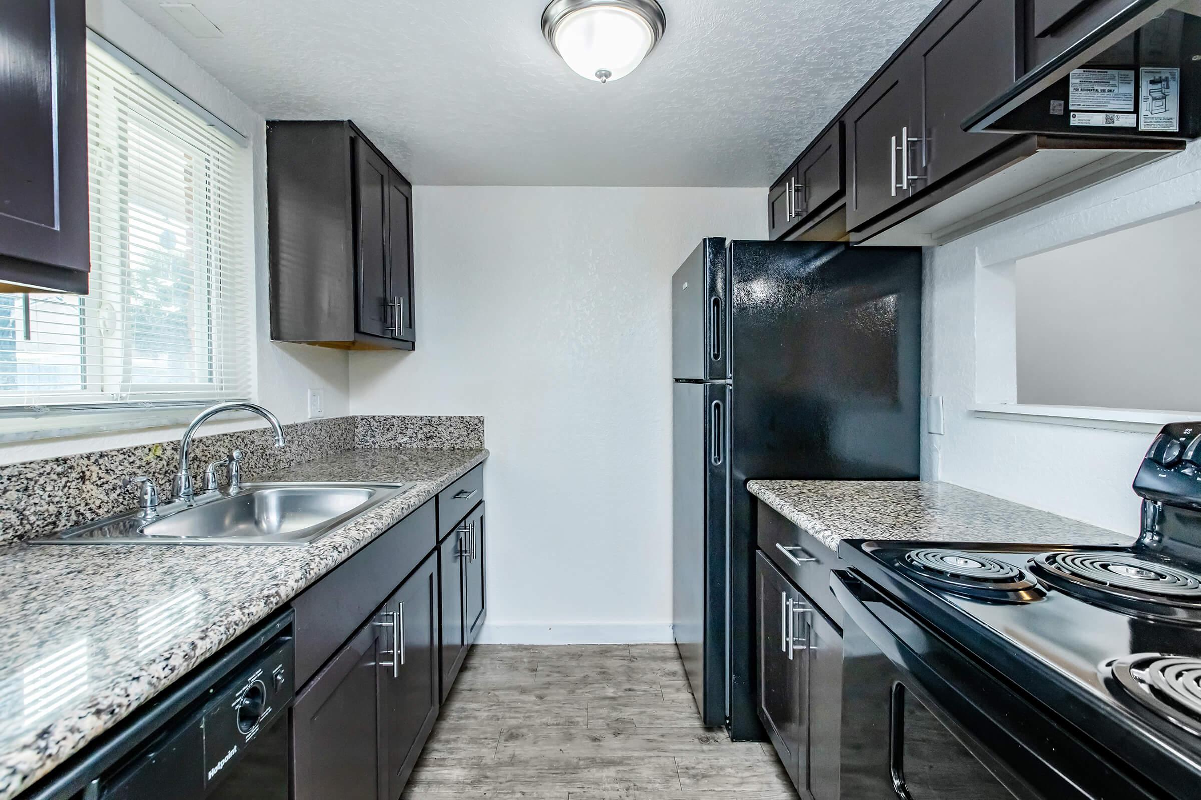 a modern kitchen with stainless steel appliances