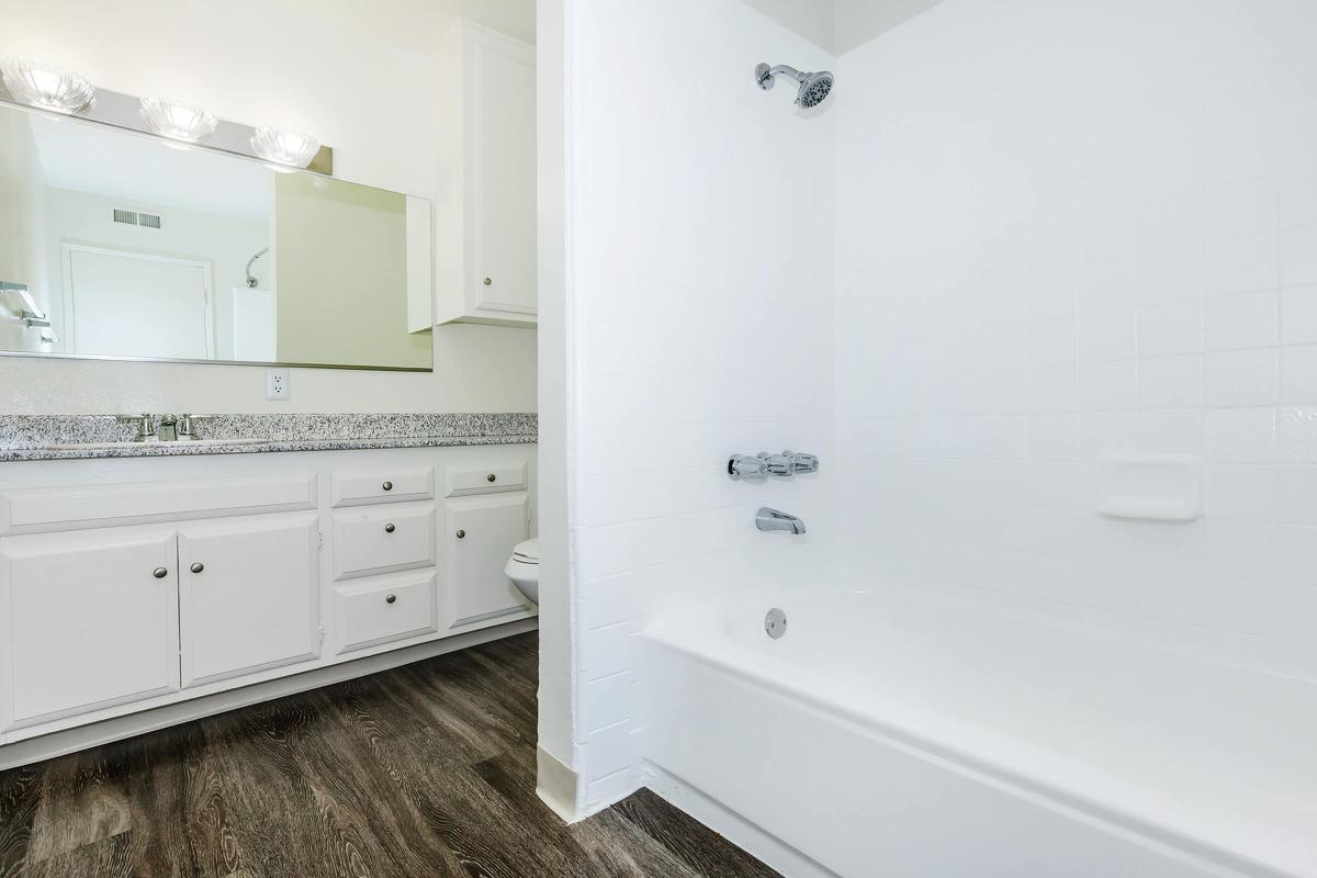 Unfurnished bathroom with wooden floors