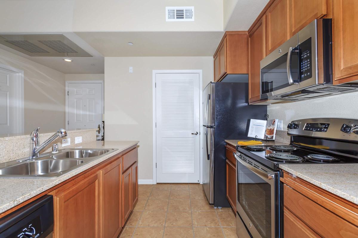 a modern kitchen with stainless steel appliances