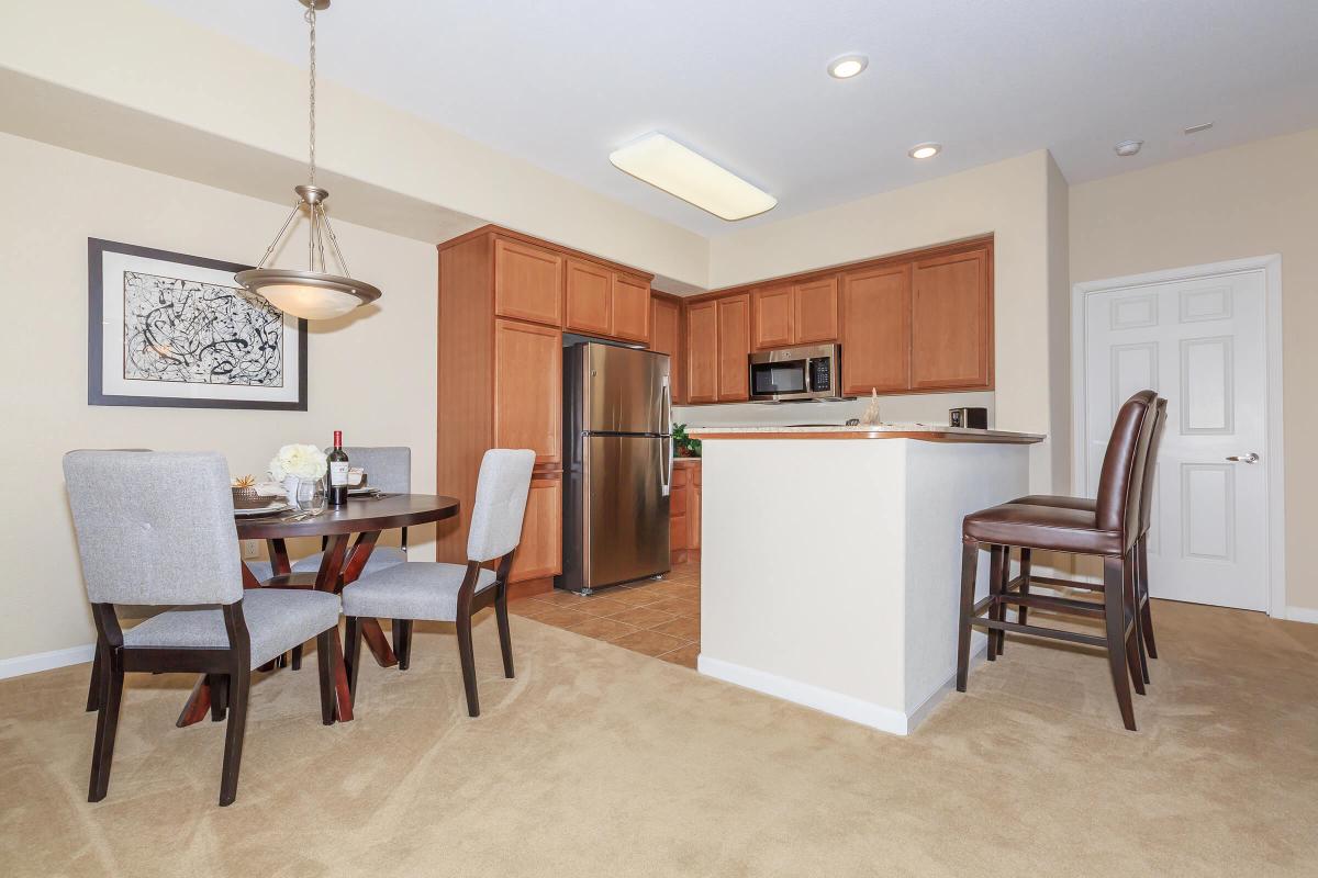 a kitchen with a dining room table