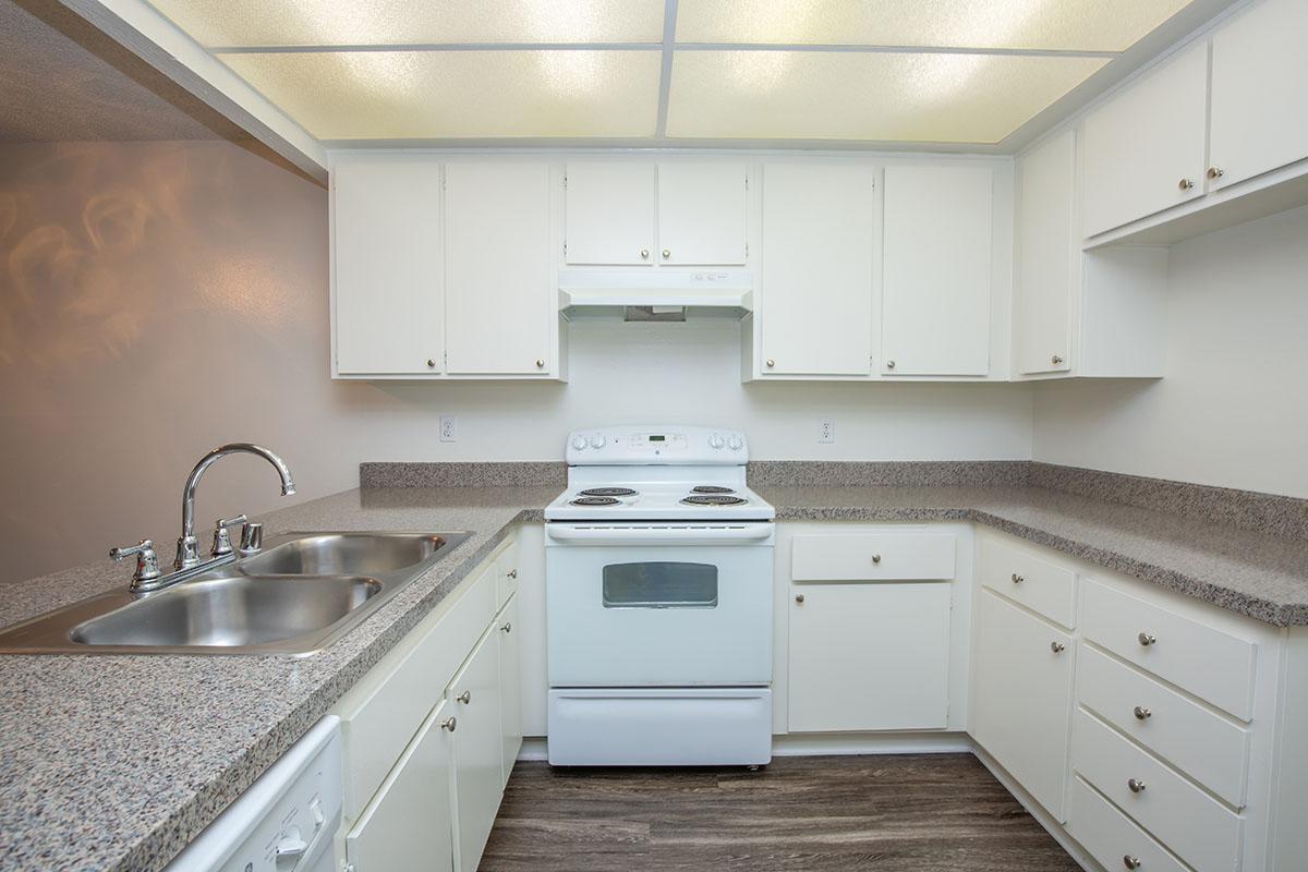 Unfurnished kitchen with wooden floors