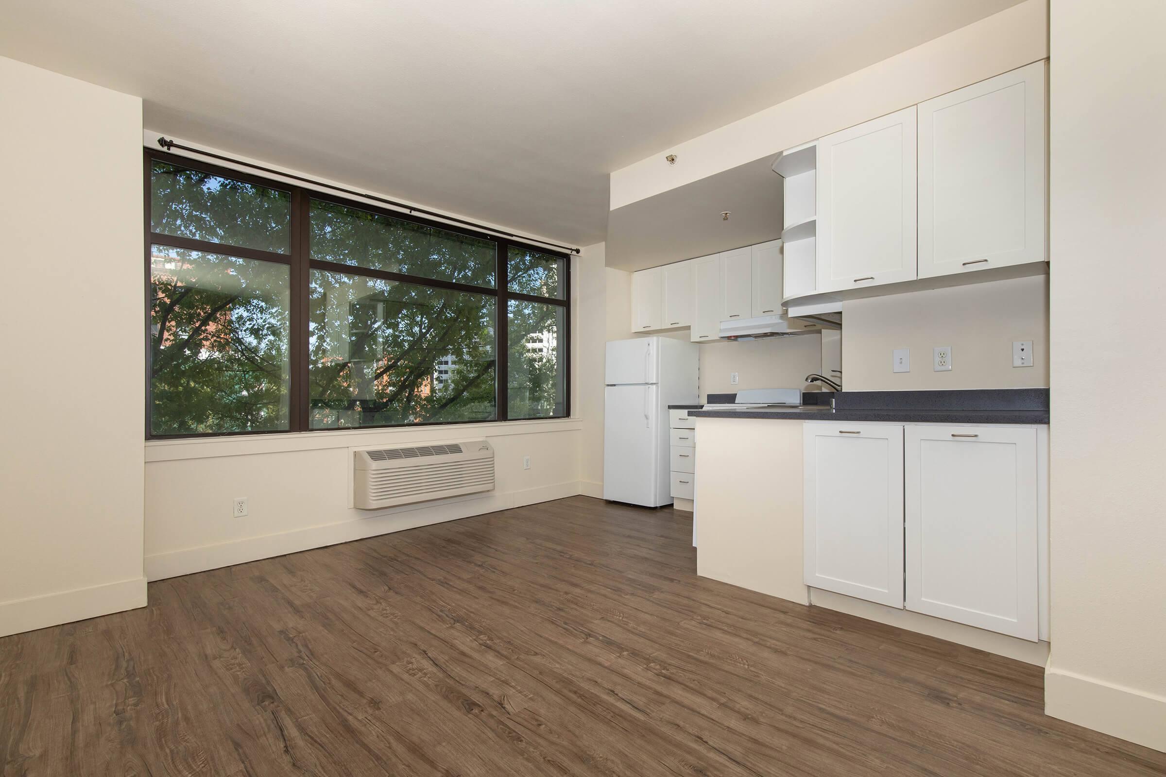 a kitchen with a large window