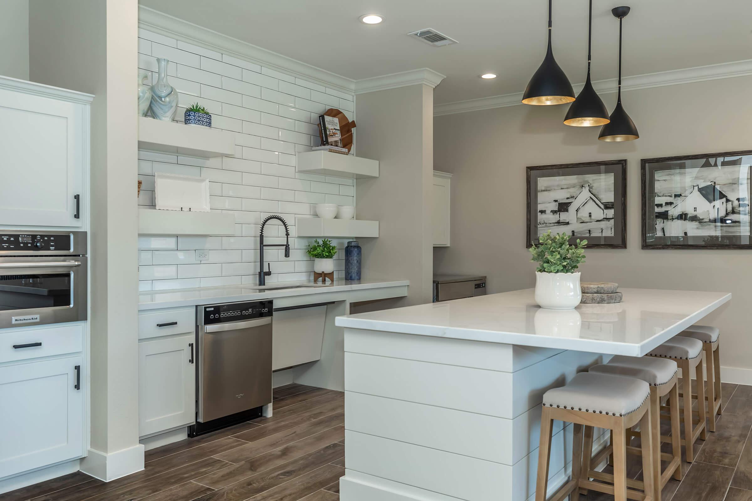 a kitchen with a table in a room