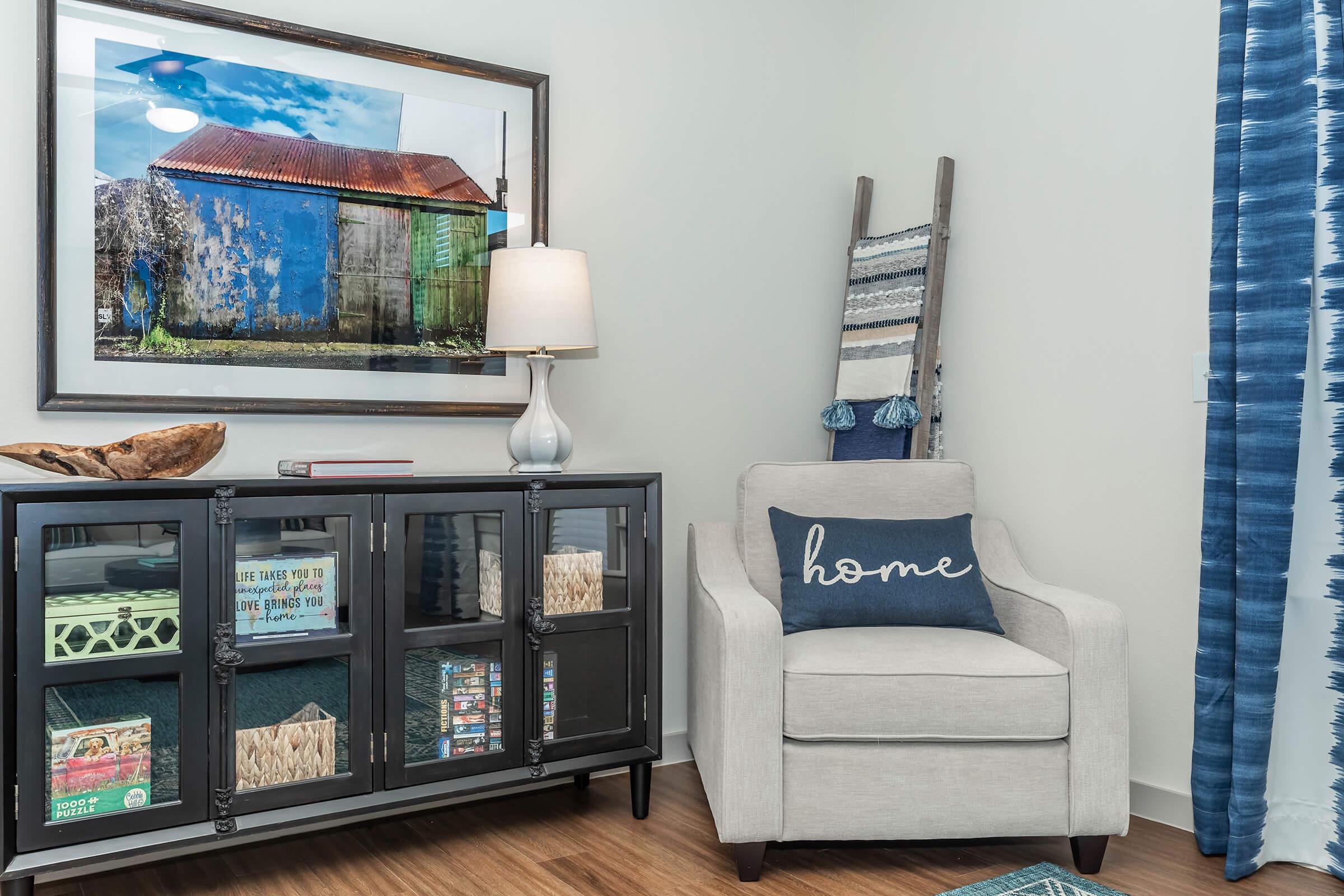 a room filled with furniture and a tv