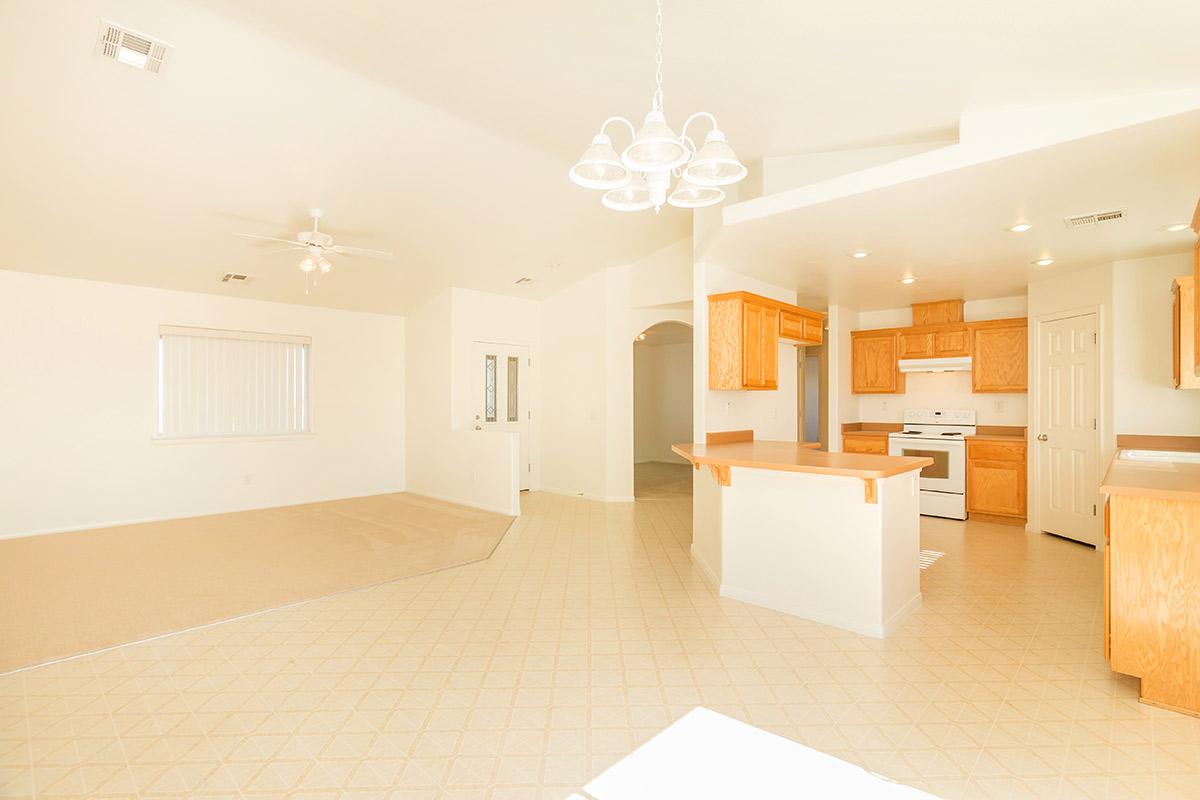 a room filled with furniture and a flat screen tv