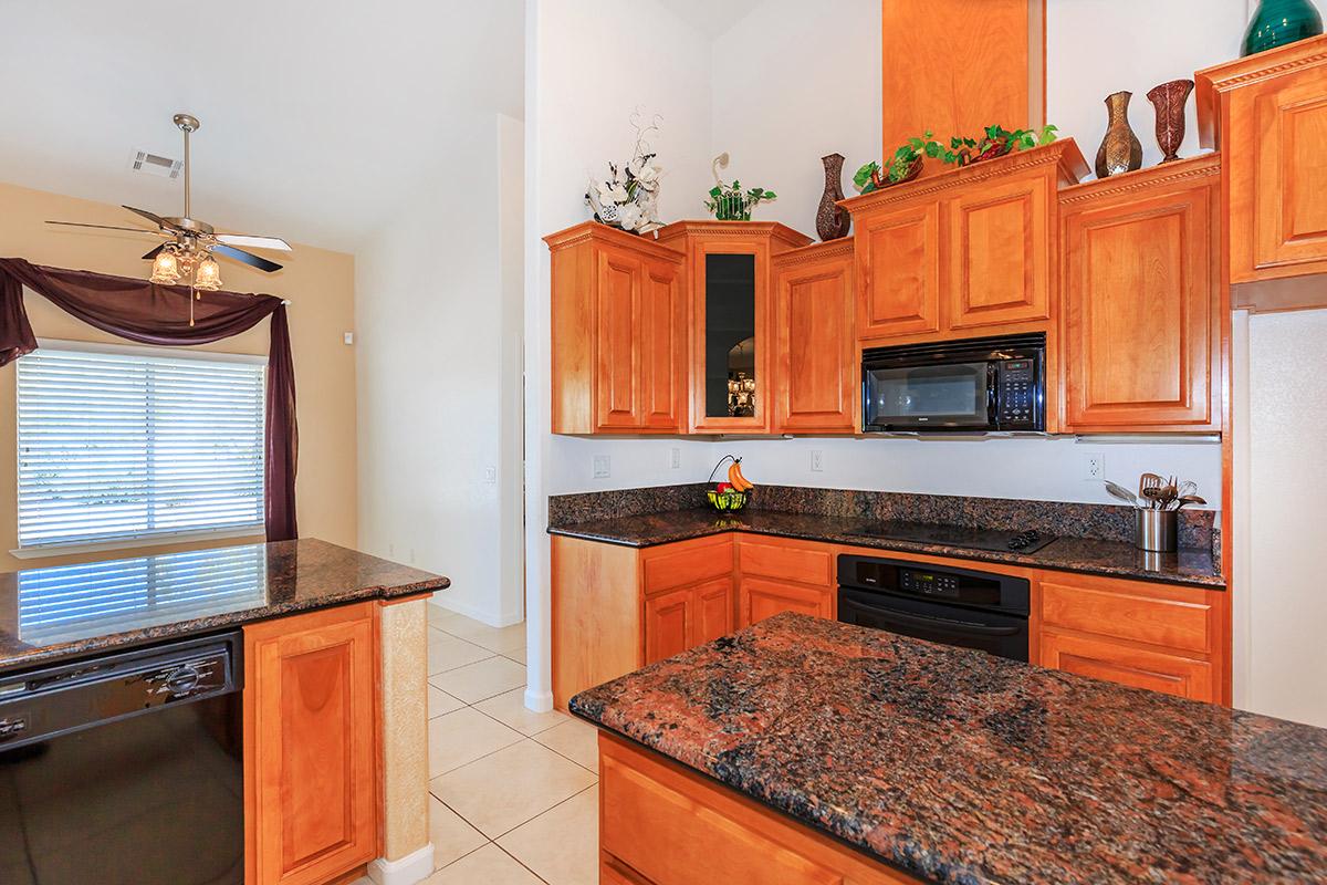 a kitchen with a stove and a sink