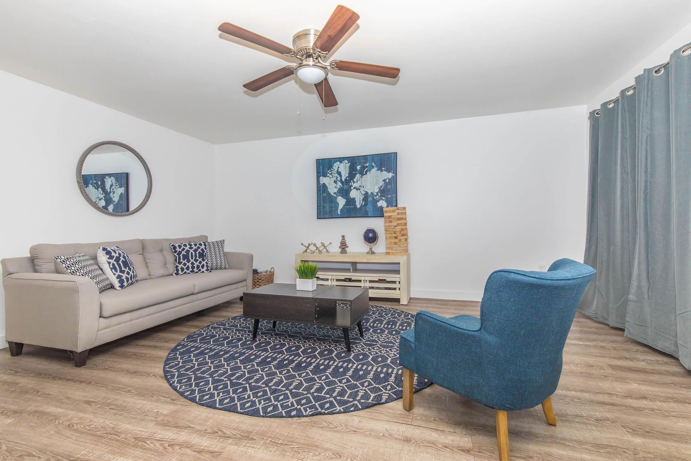 a living room with blue walls