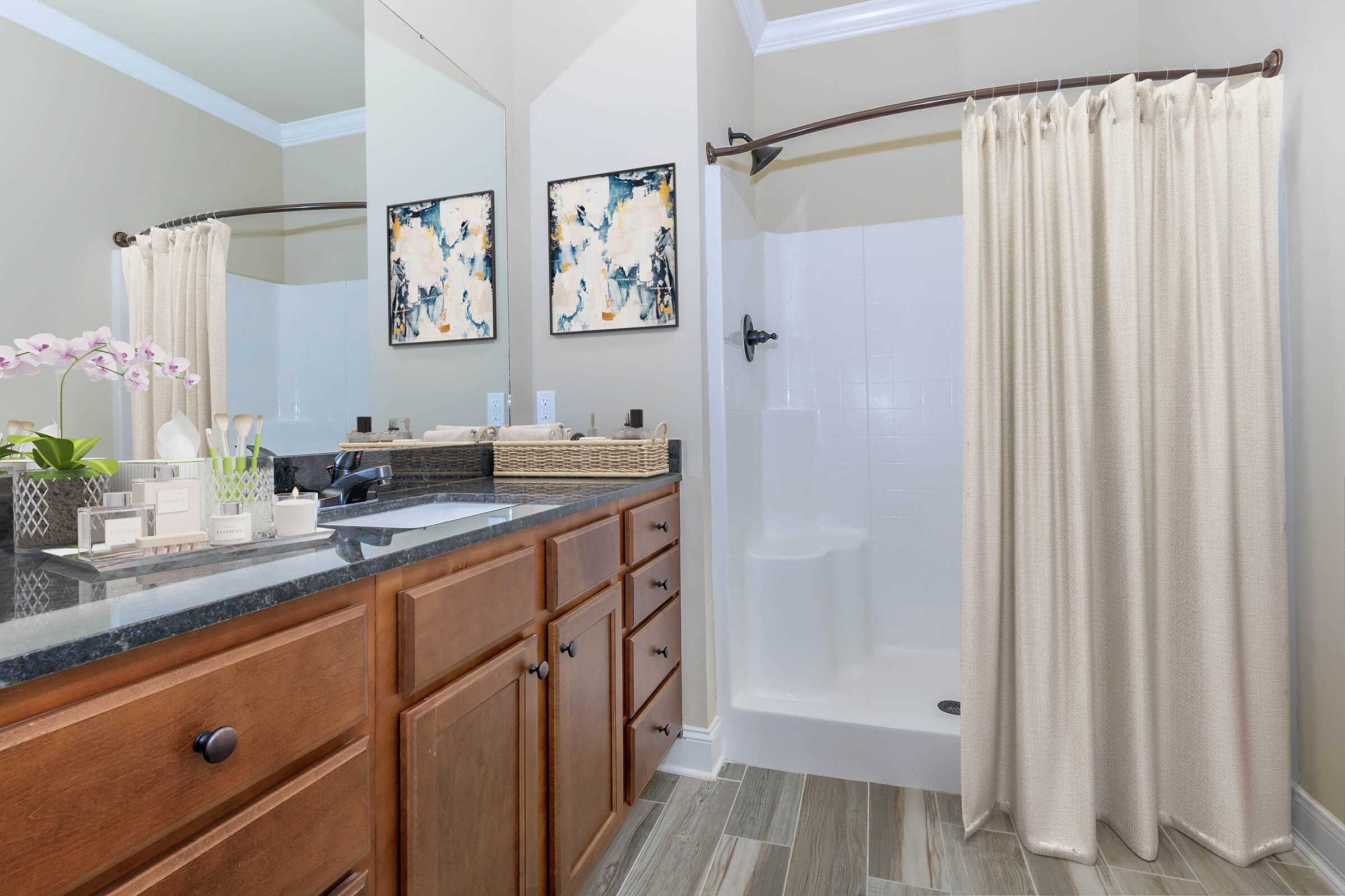 a kitchen with a sink and a mirror