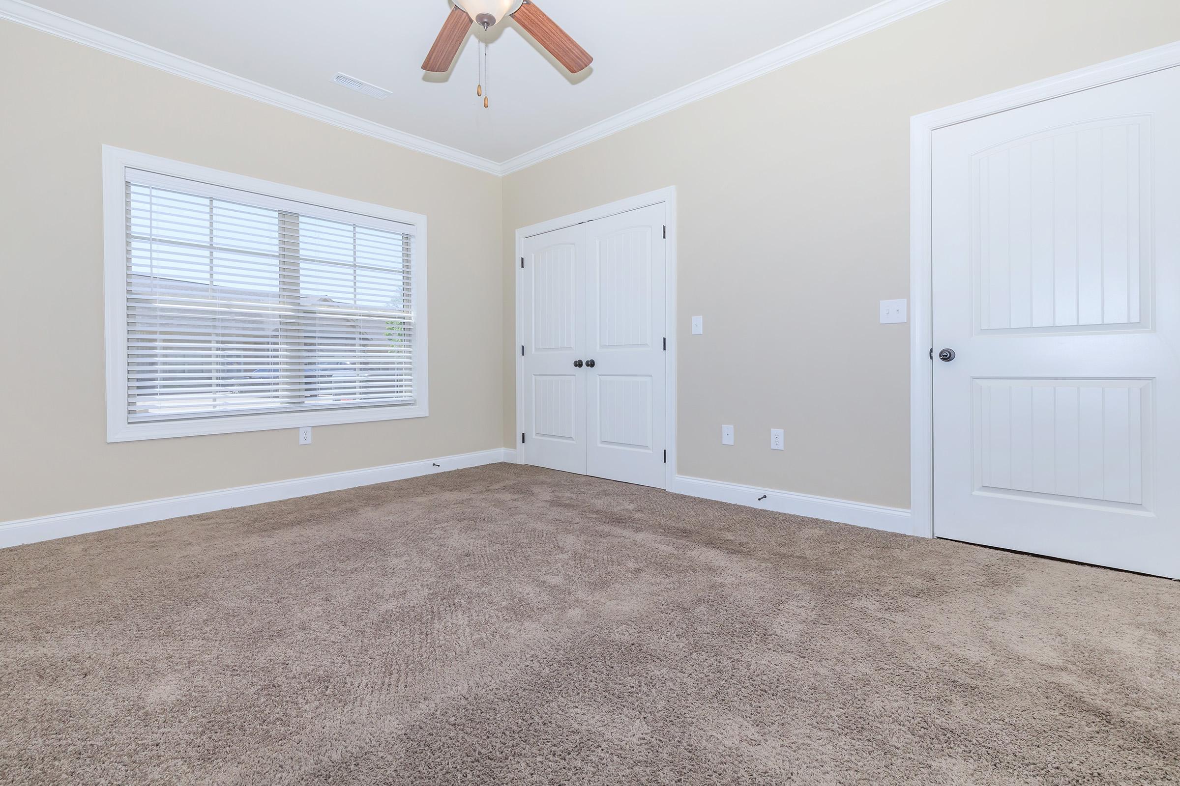 comfortable bedroom at Villas at Kelly Springs in Huntsville, AL