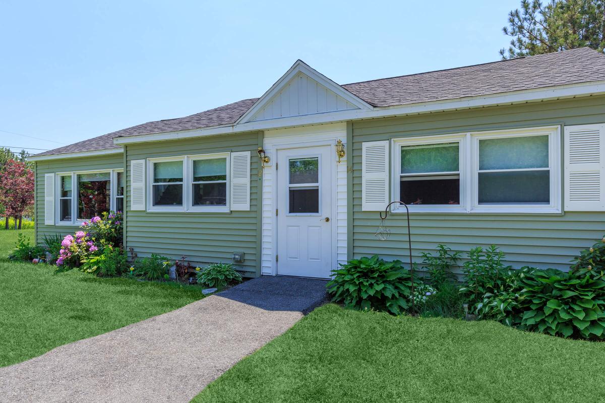 a large lawn in front of a house