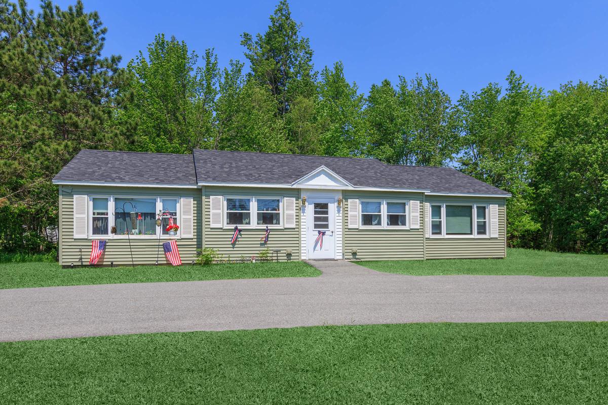 a large lawn in front of a house